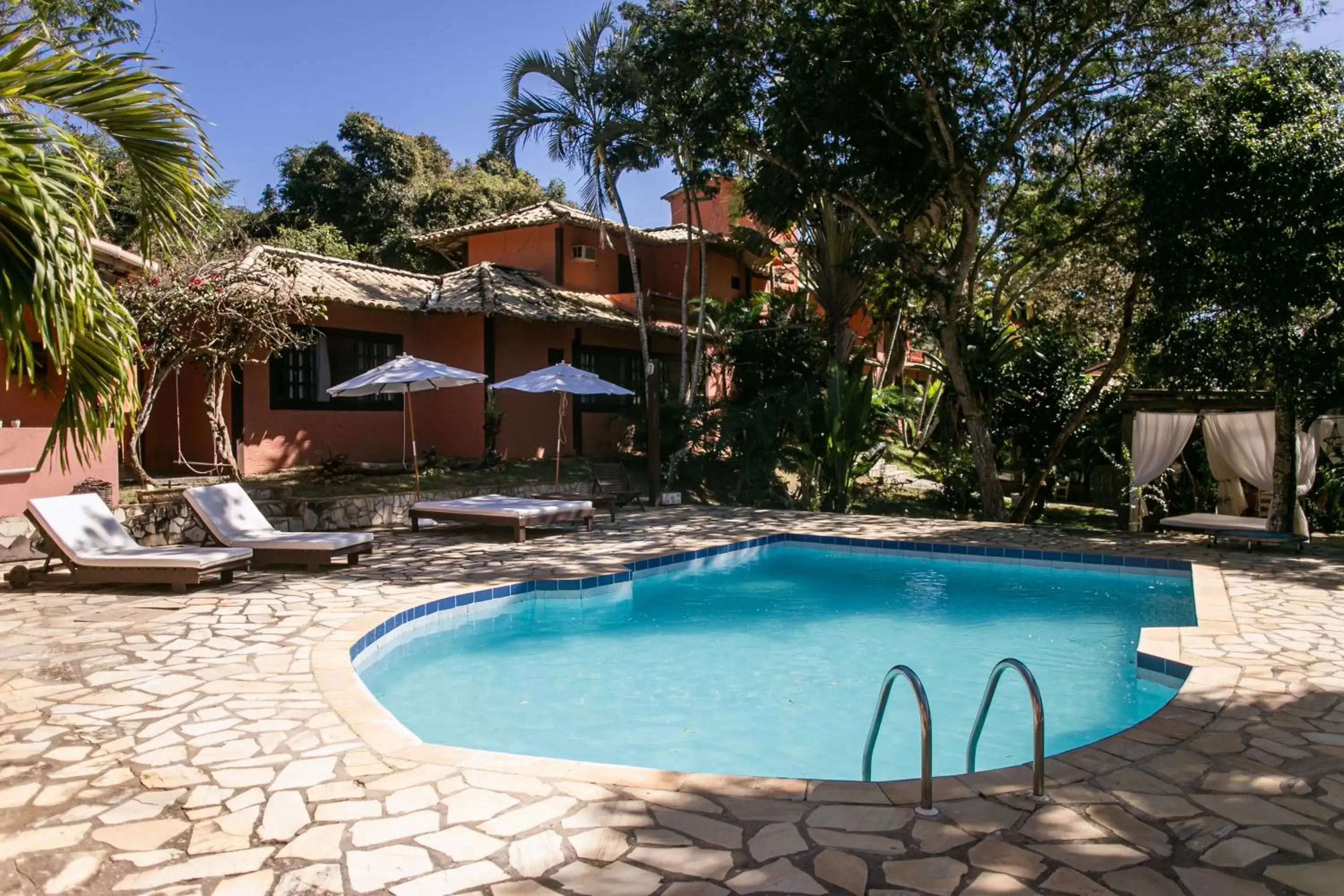 Garden, Swimming Pool in Pousada Casa Cactus Búzios