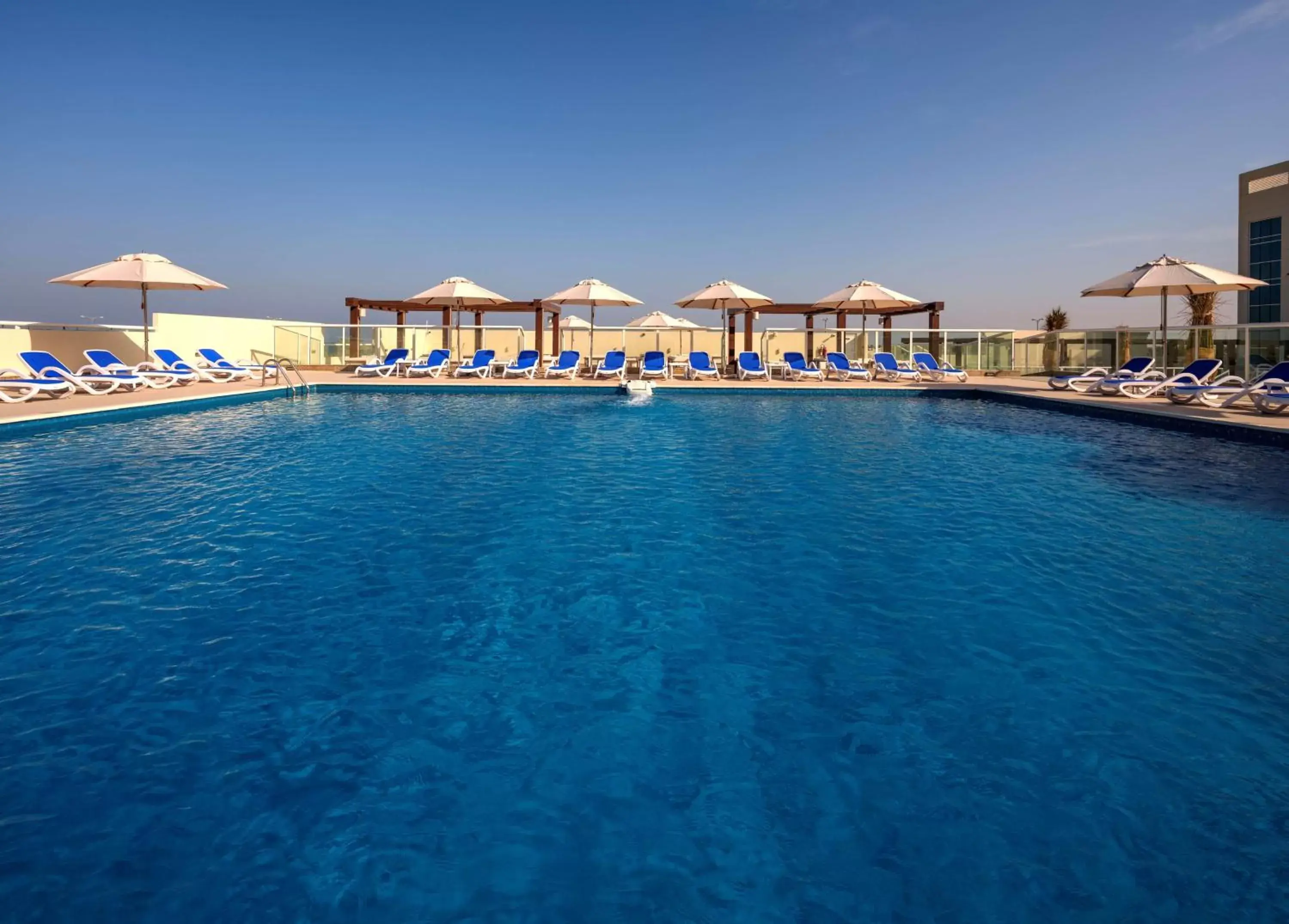 Summer, Swimming Pool in Radisson Resort Ras Al Khaimah Marjan Island