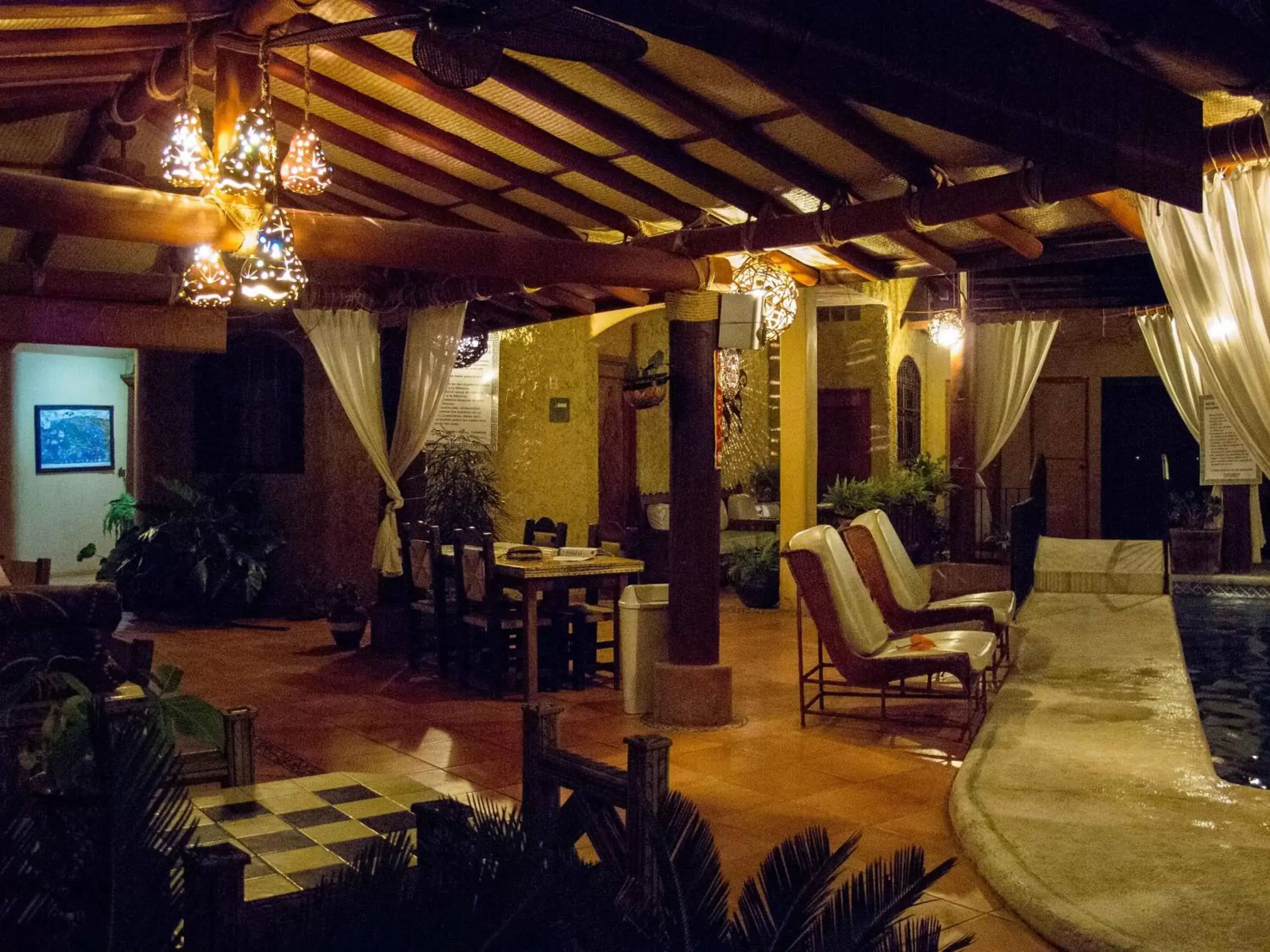 Communal lounge/ TV room, Restaurant/Places to Eat in Hotel Villas Las Azucenas