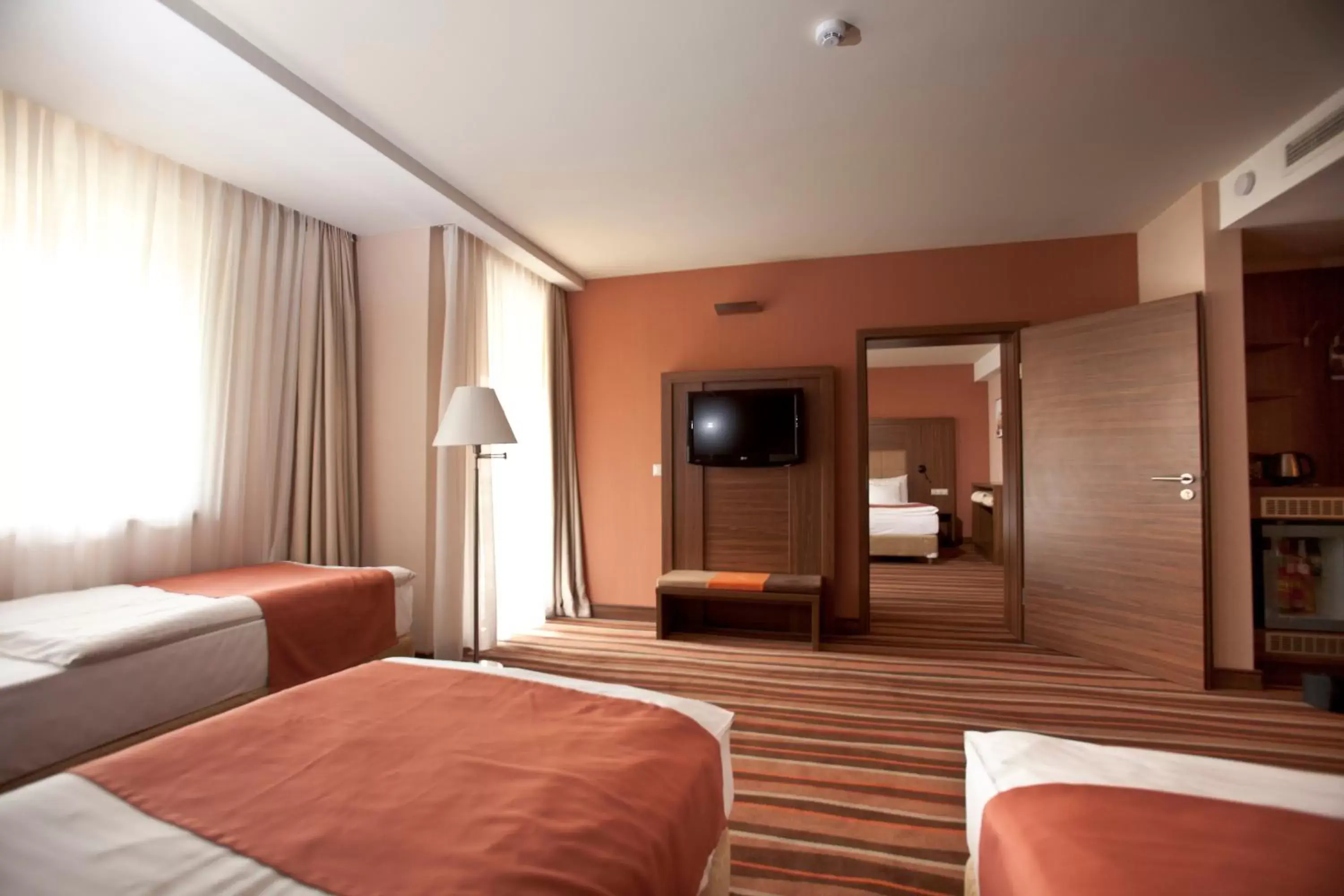 Bedroom, TV/Entertainment Center in Hotel Makar Sport & Wellness