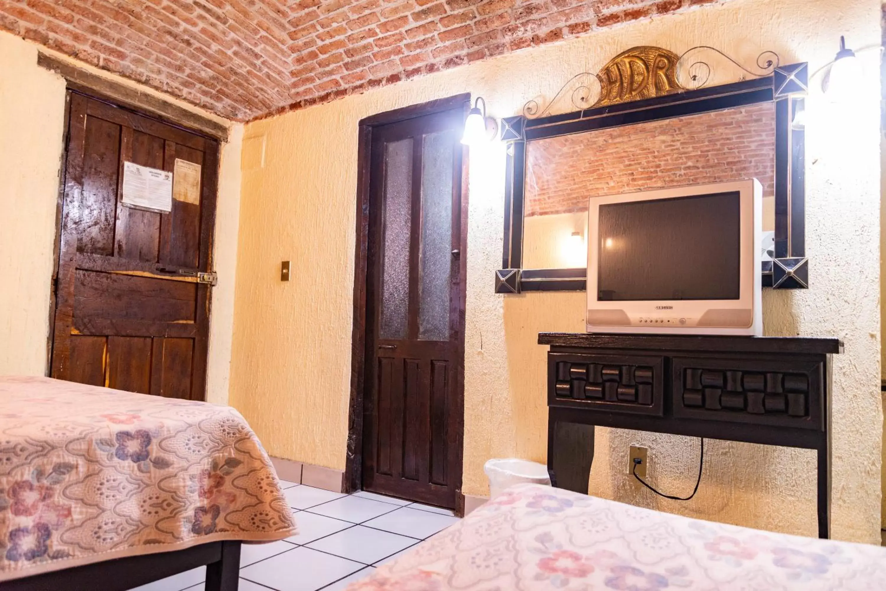 Photo of the whole room, TV/Entertainment Center in Hotel Hacienda de Cobos