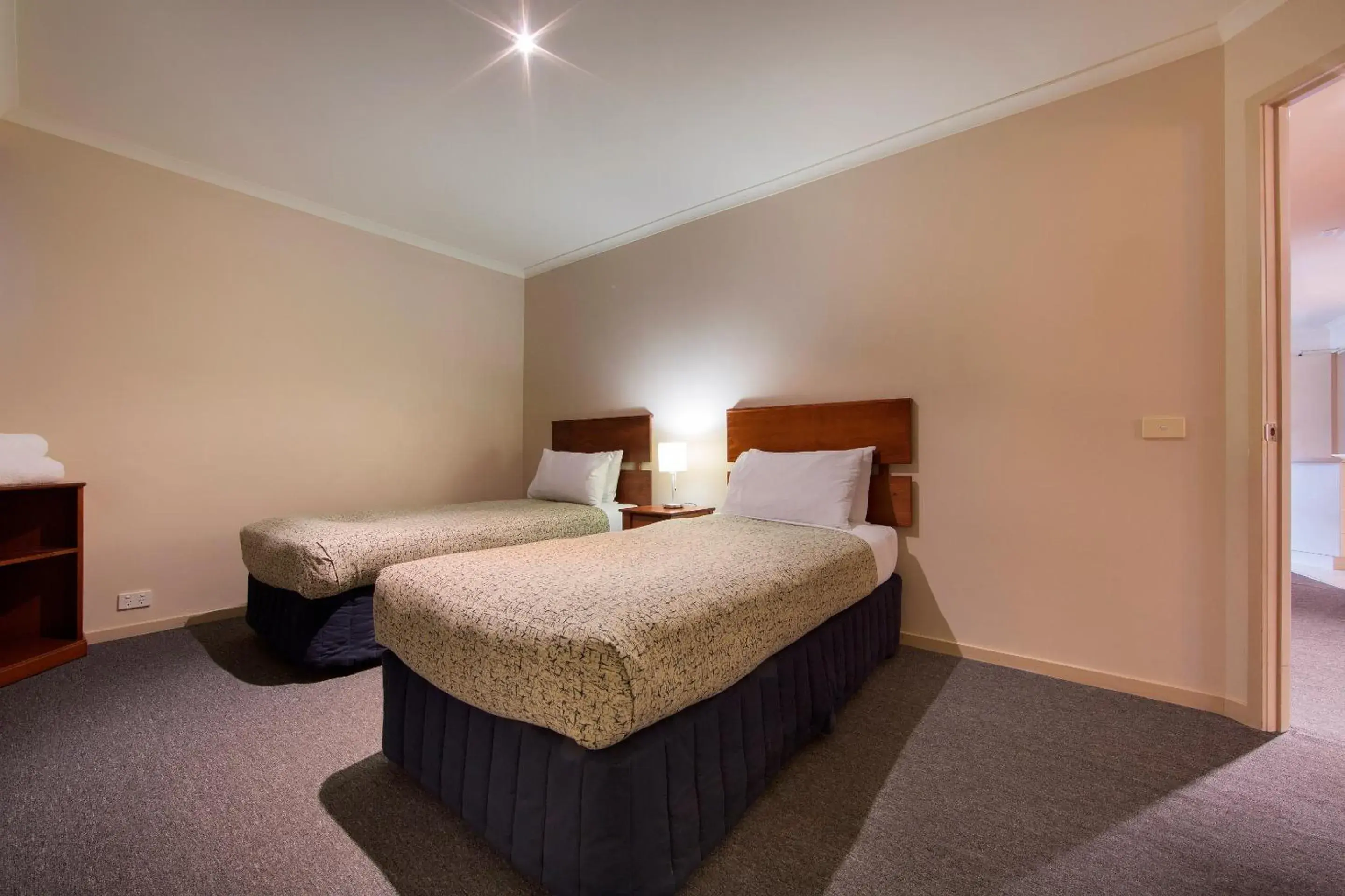 Bedroom, Bed in Canberra Parklands Central Apartment Hotel