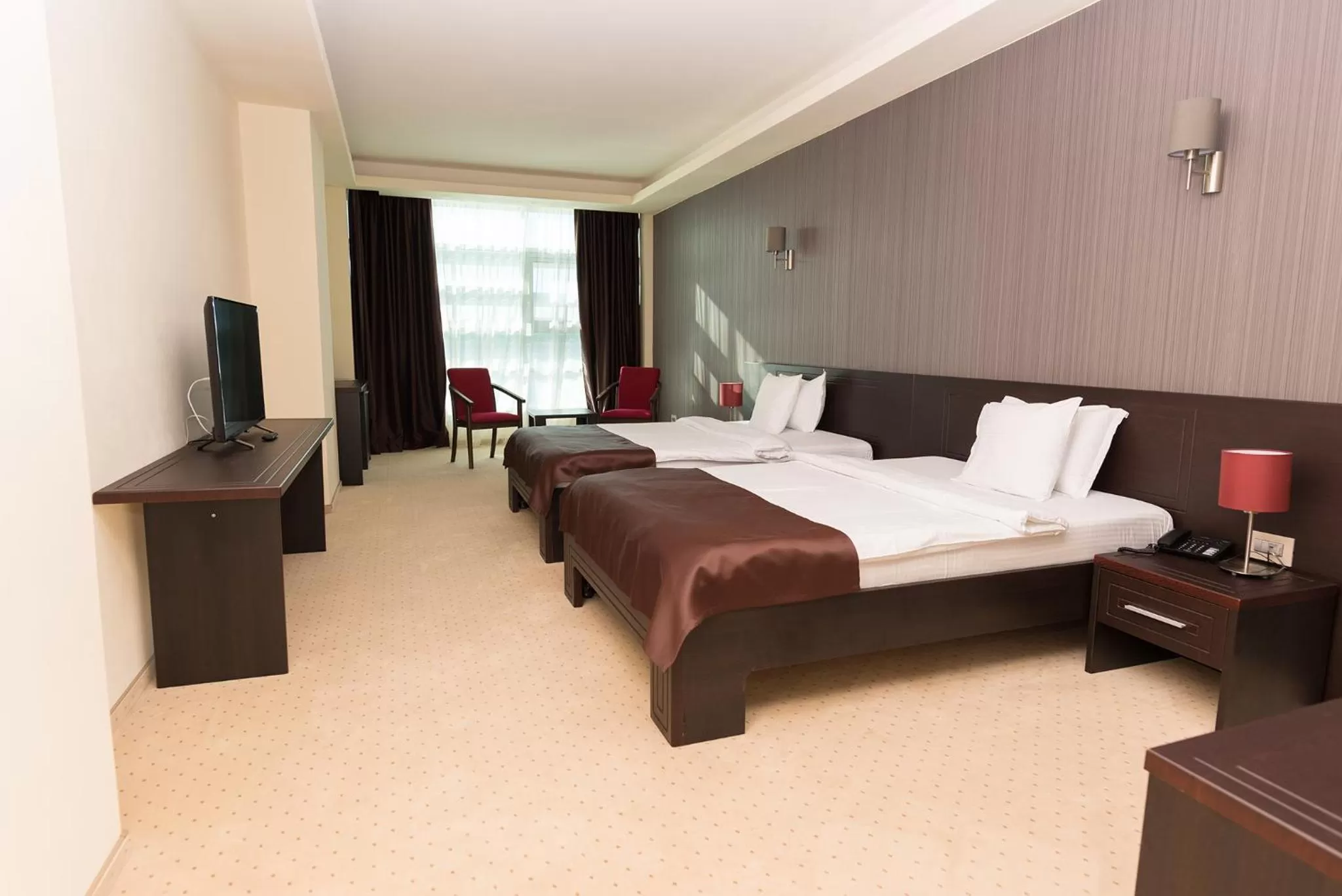 Photo of the whole room, Bed in Ramada by Wyndham Constanta