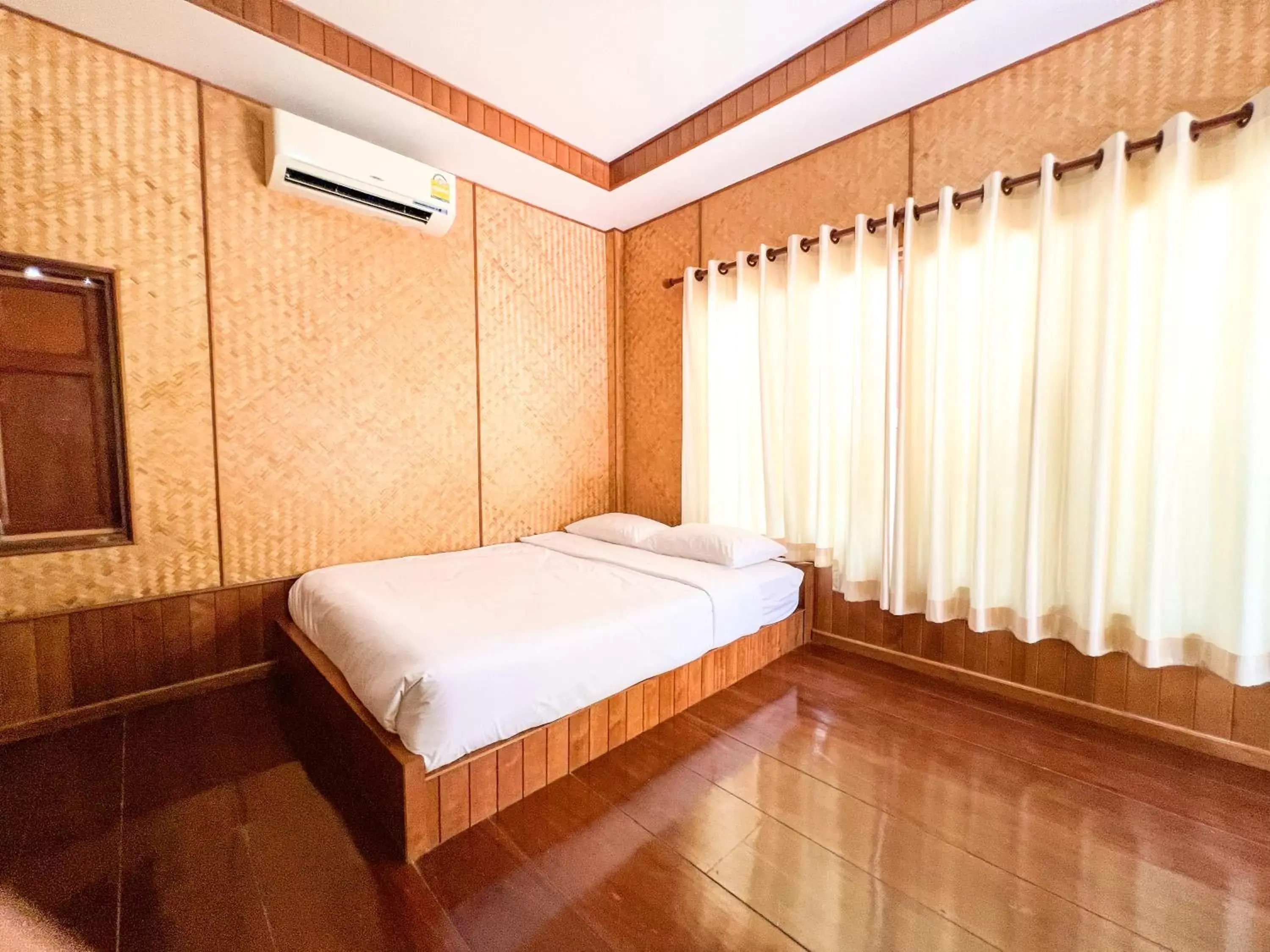 Bed in Baan Siriporn Resort - โรงแรมบ้านศิริพร รีสอร์ท Bed in Baan Siriporn Resort - โรงแรมบ้านศิริพร รีสอร์ท