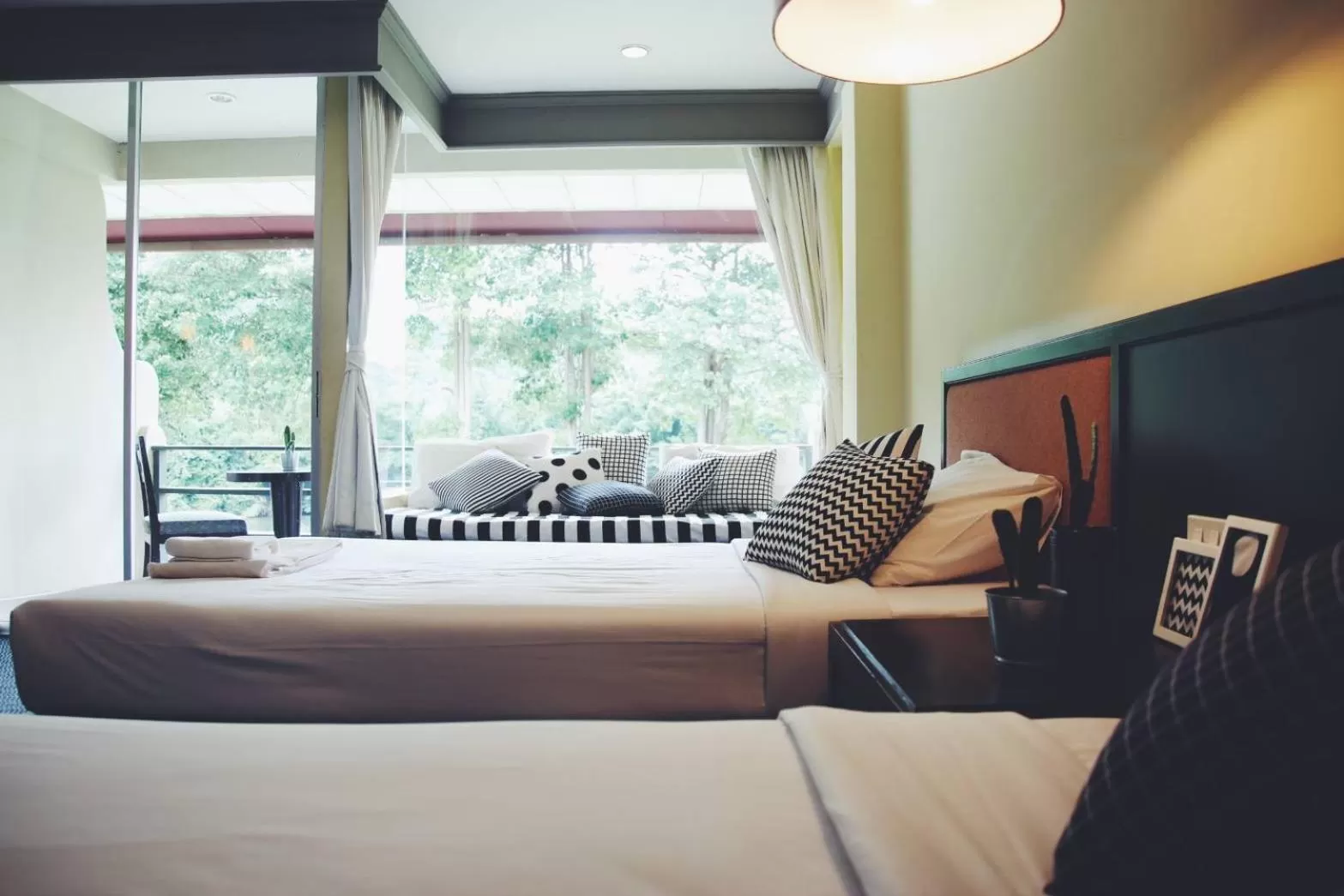 Photo of the whole room, Bed in Aekpailin River Kwai Resort