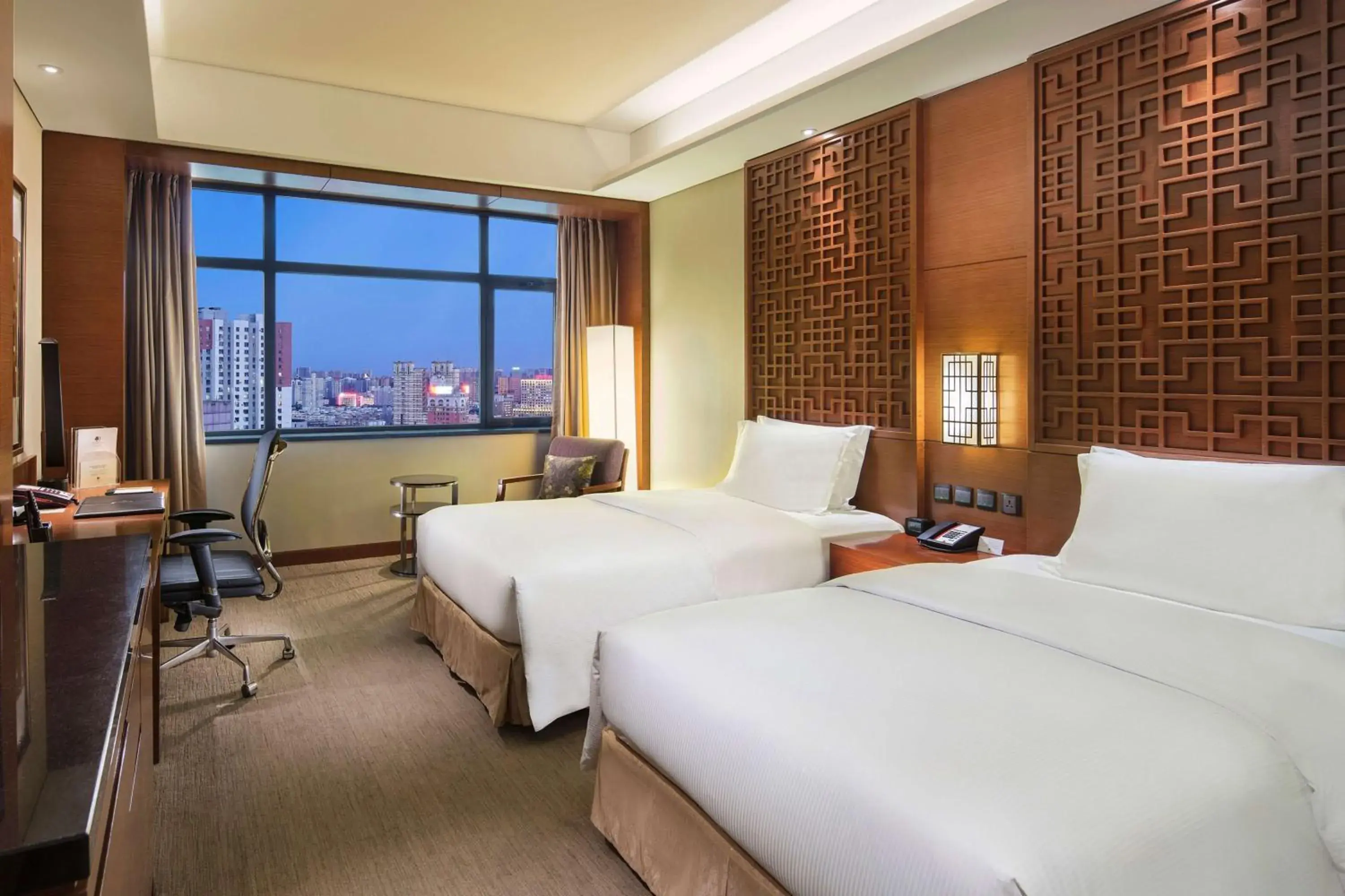 Bed in DoubleTree By Hilton Shenyang Hotel