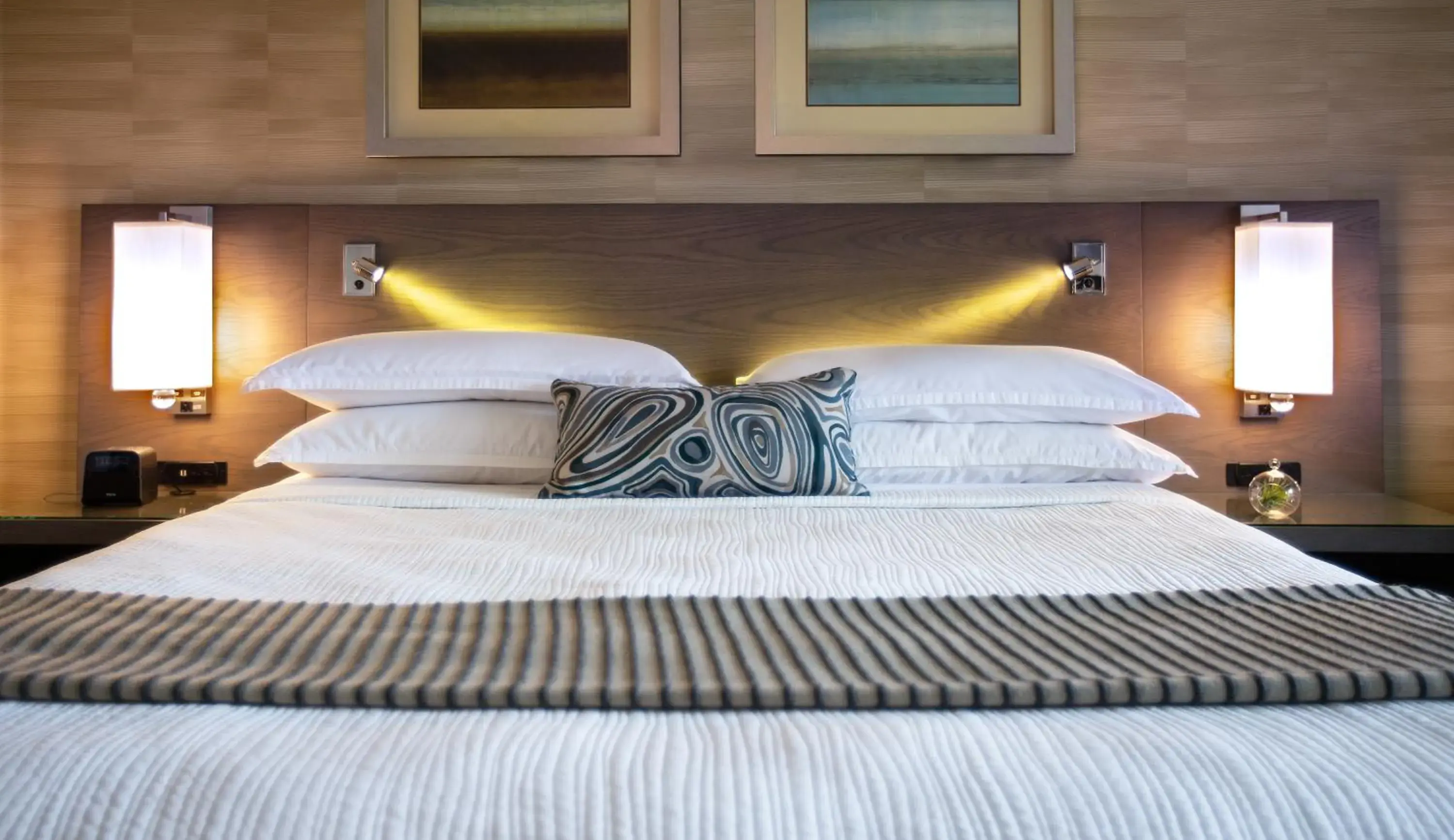 Bed in West Beach Inn, a Coast Hotel