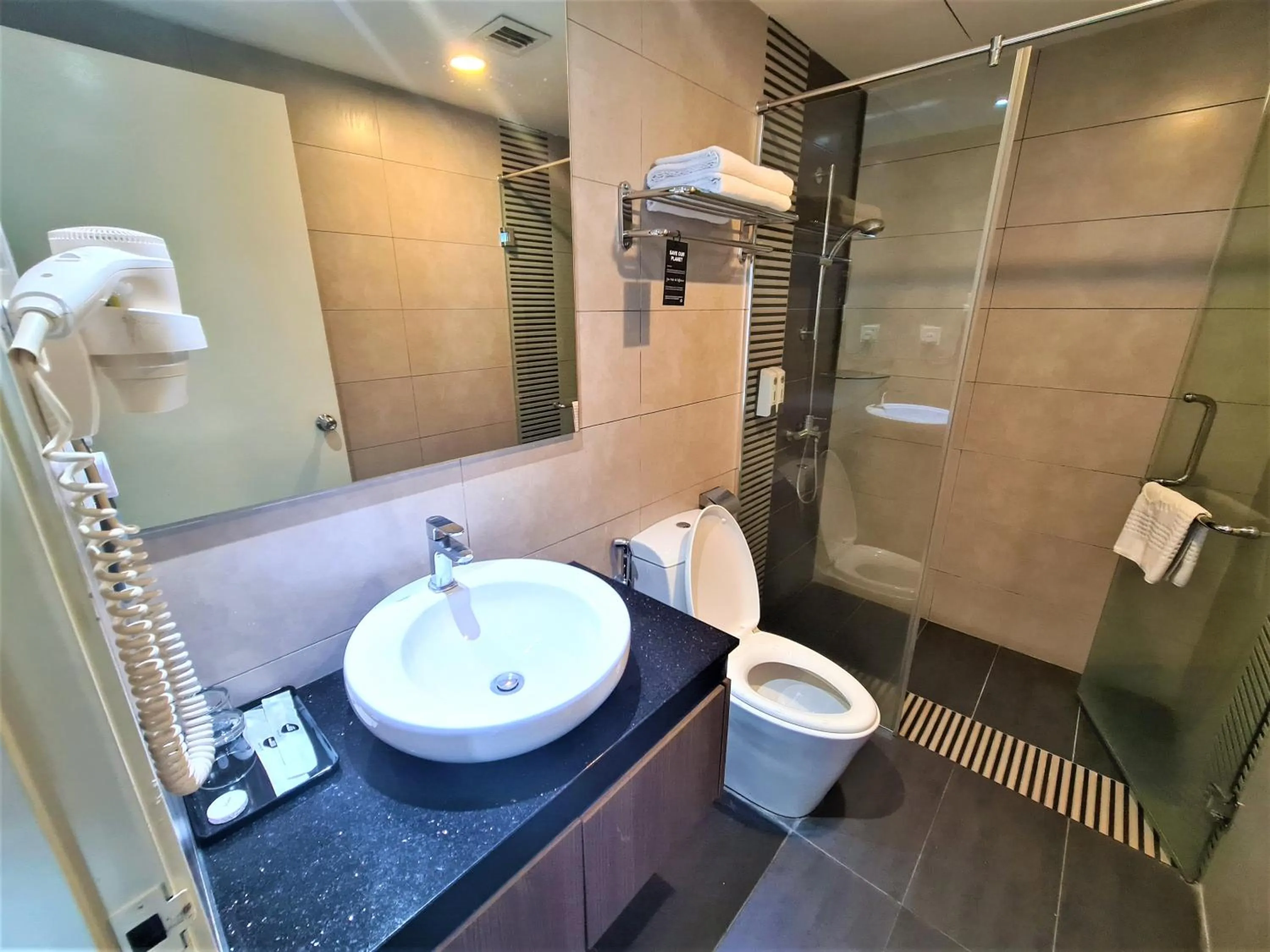 Toilet in Nexus Regency Suites & Hotel