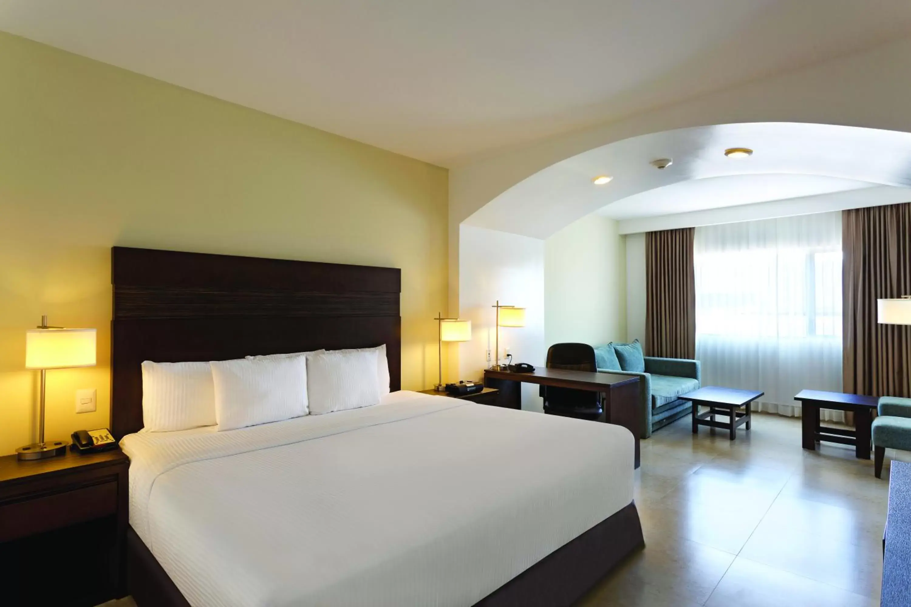 Photo of the whole room, Bed in Wyndham Garden Cancun Downtown