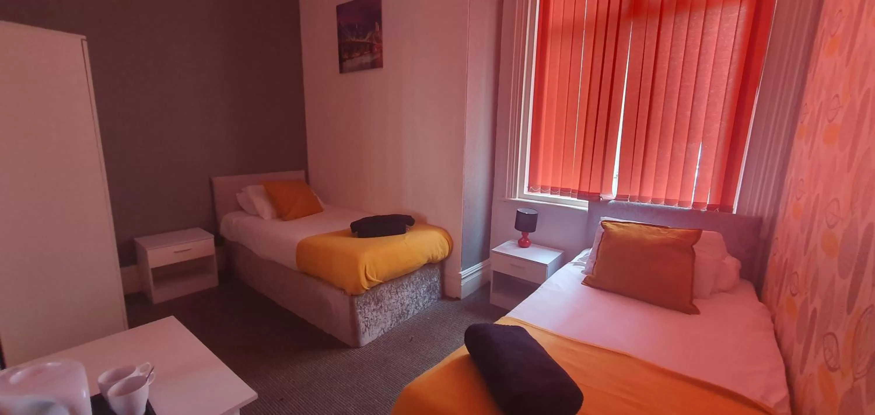 Bed in Palm Beach Hotel by the Sea