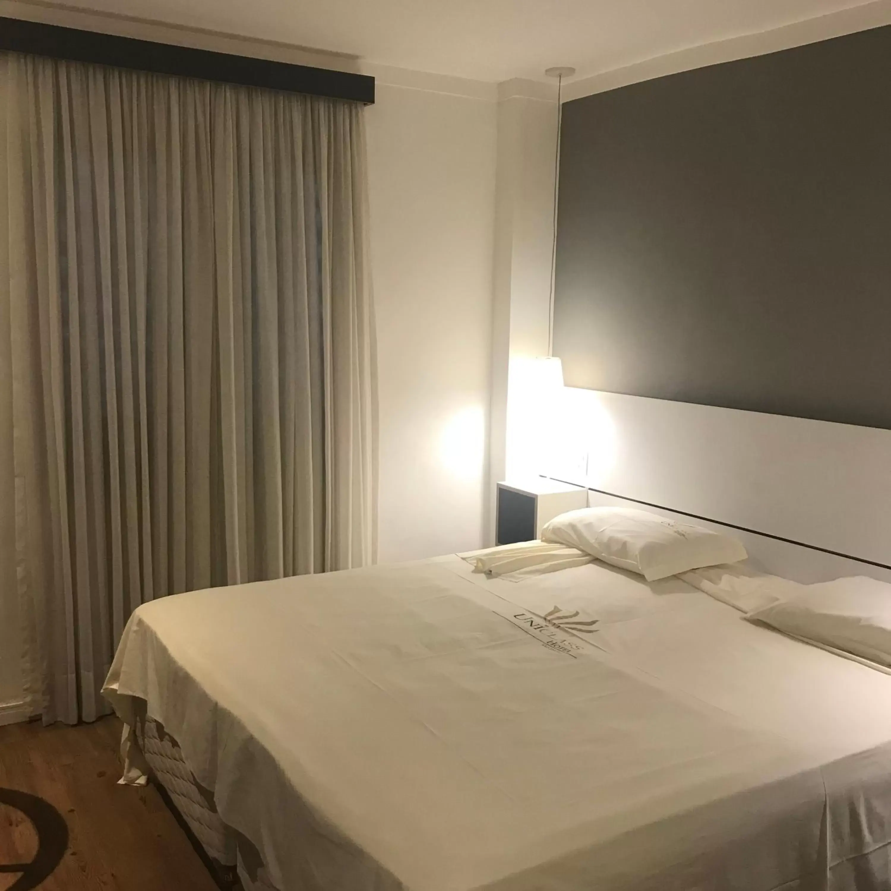 Bed in Uniclass Hotel Pinheiros