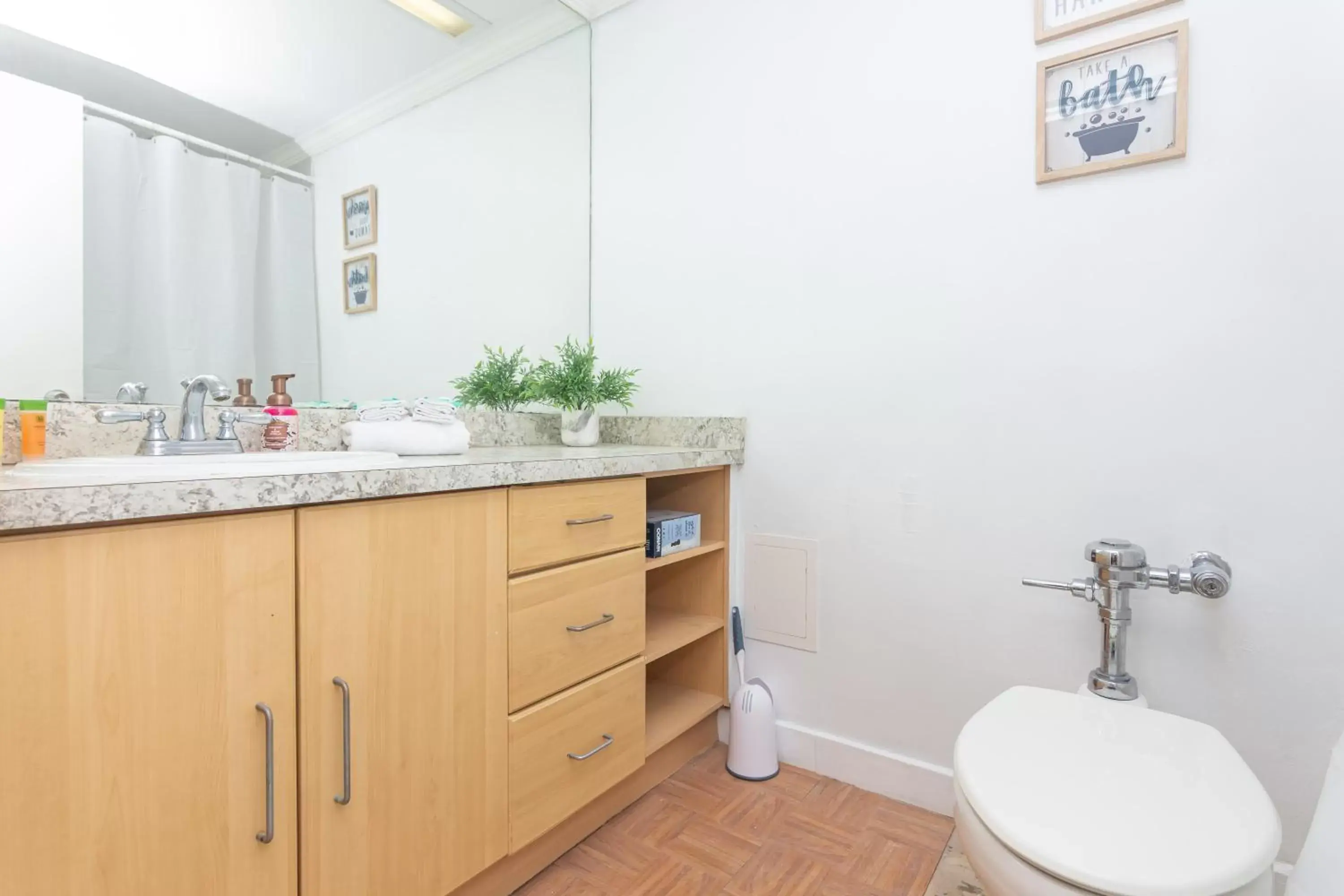 Toilet, Bathroom in Girasole Apartments