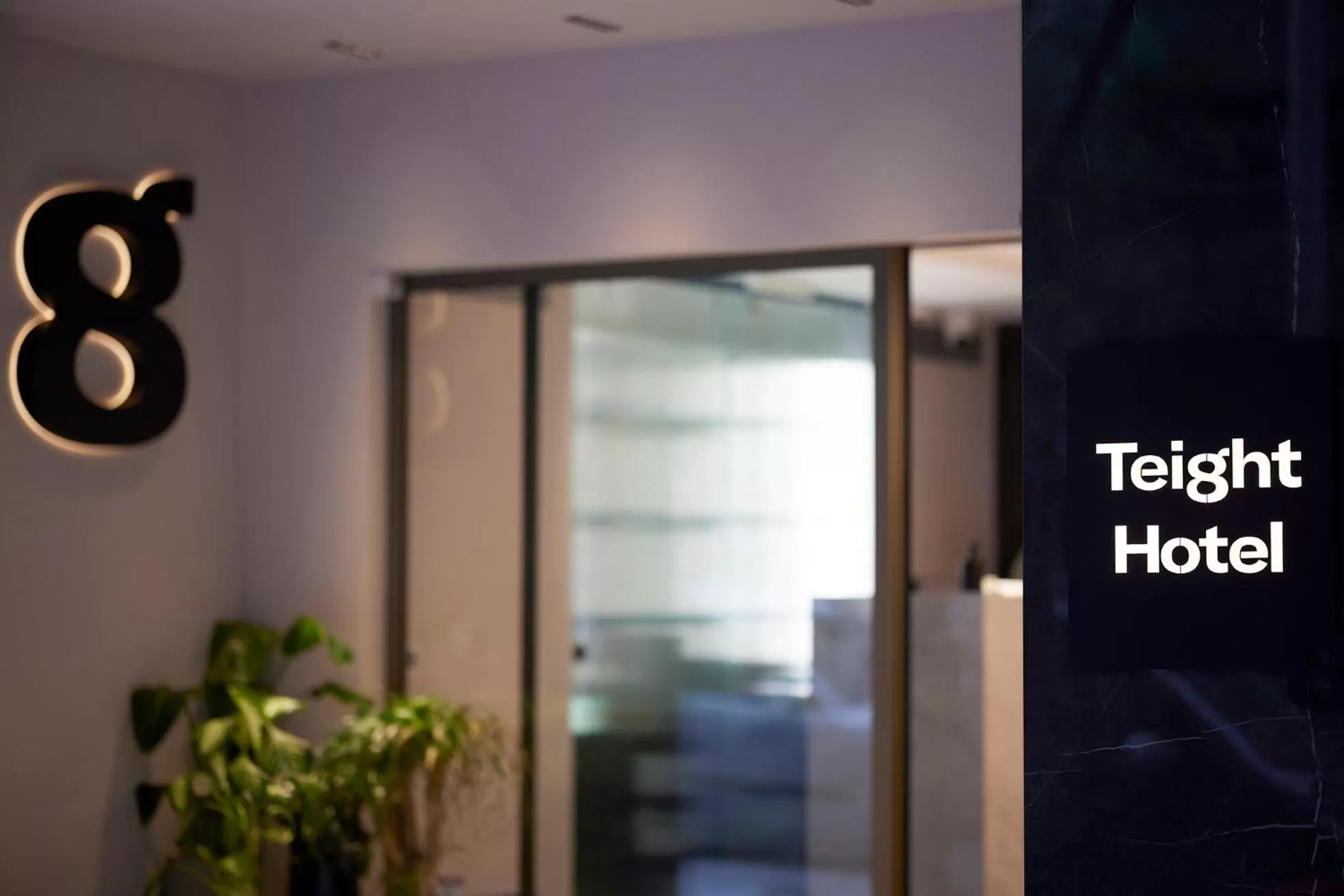 Property logo or sign in Teight Hotel