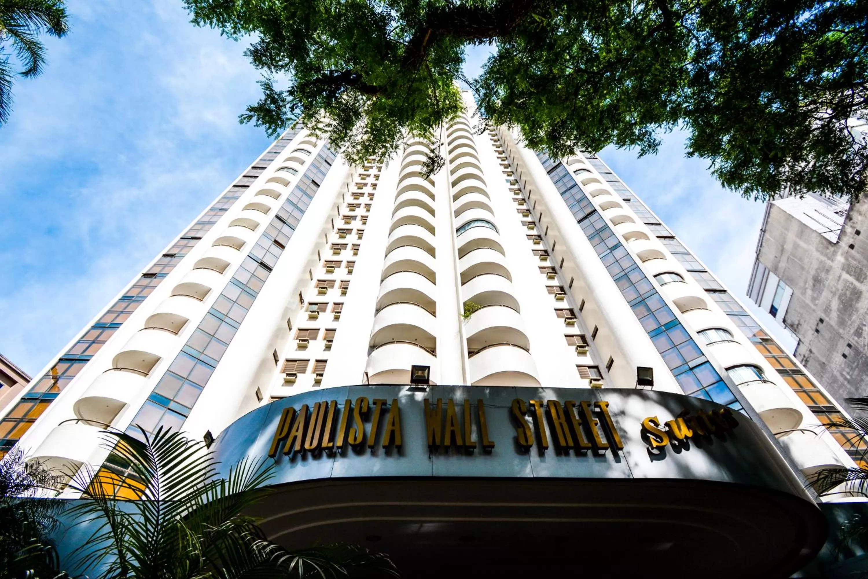 Property building in Wall Street Apartments by BnbHost