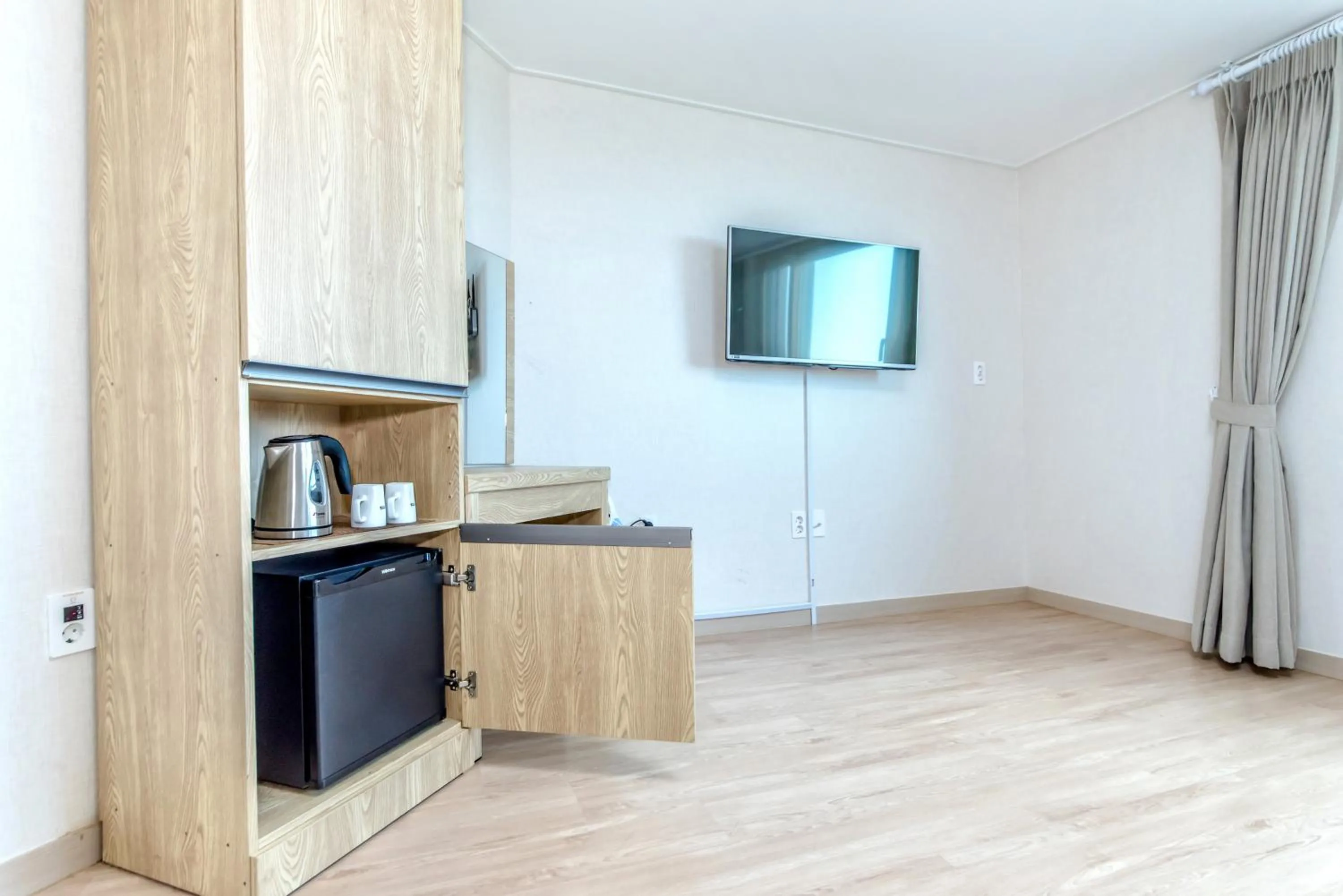 Bedroom in Jungmoon City Hotel & J-hill Hotel