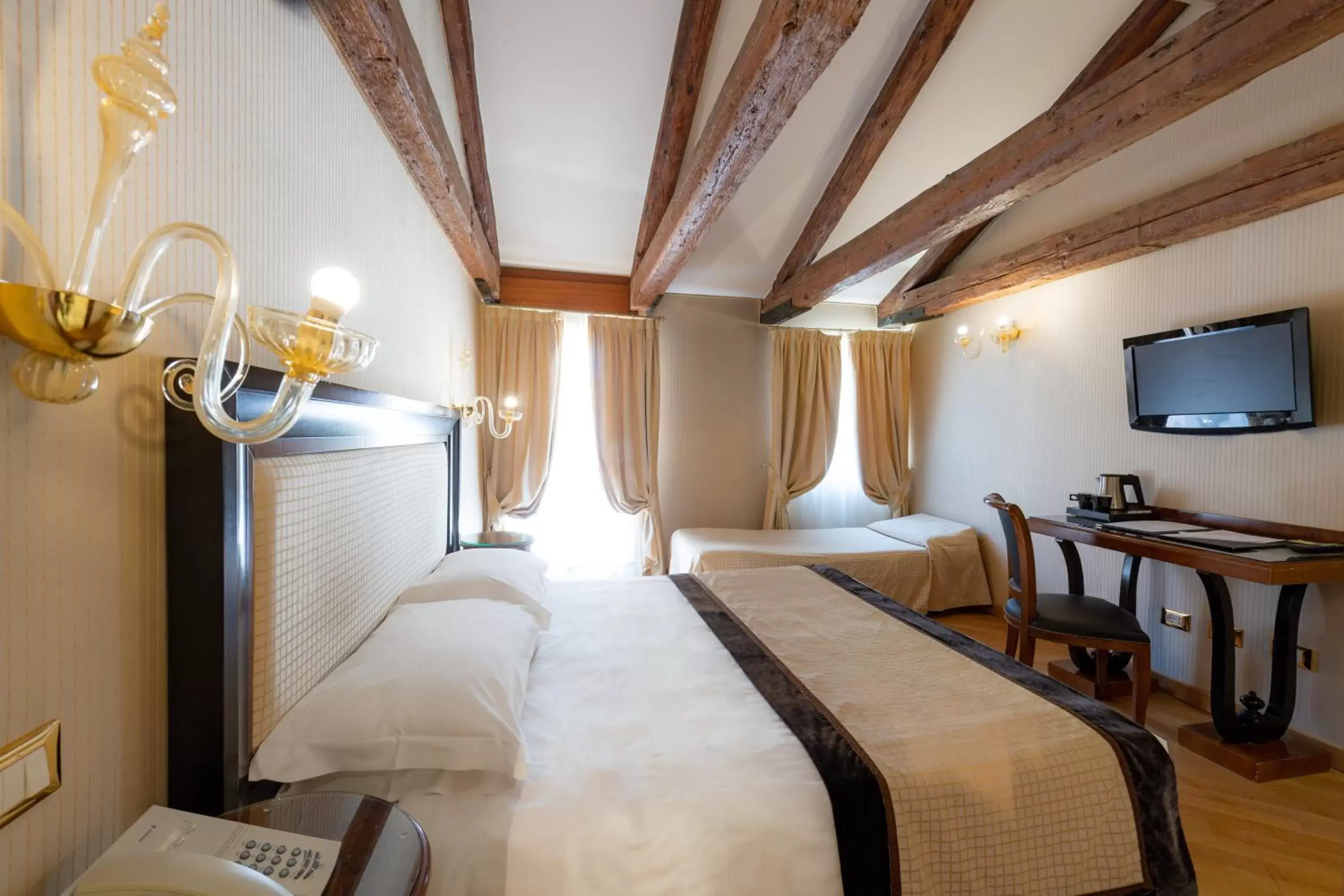 Photo of the whole room, Bed in Hotel Paganelli