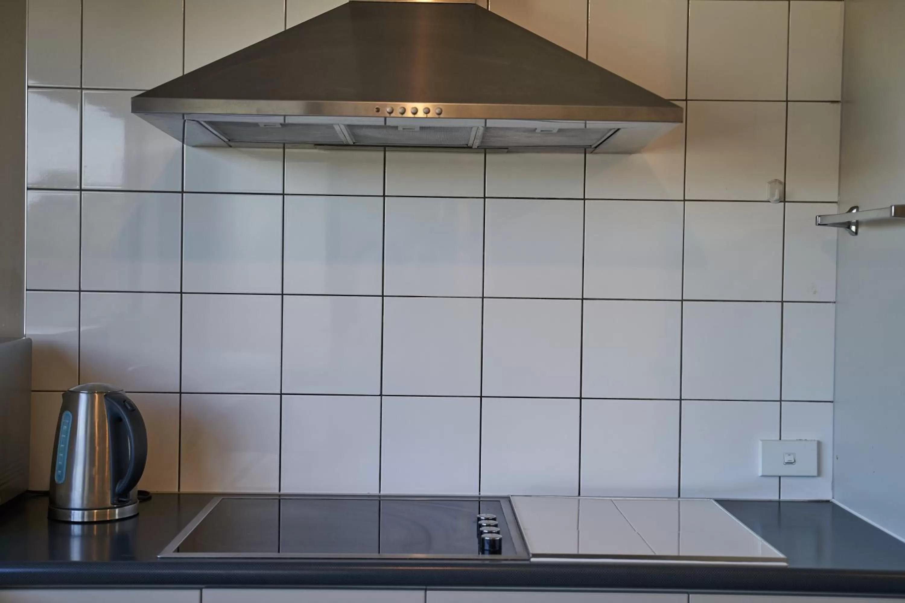 Kitchen or kitchenette in Azena Suites & Apartment