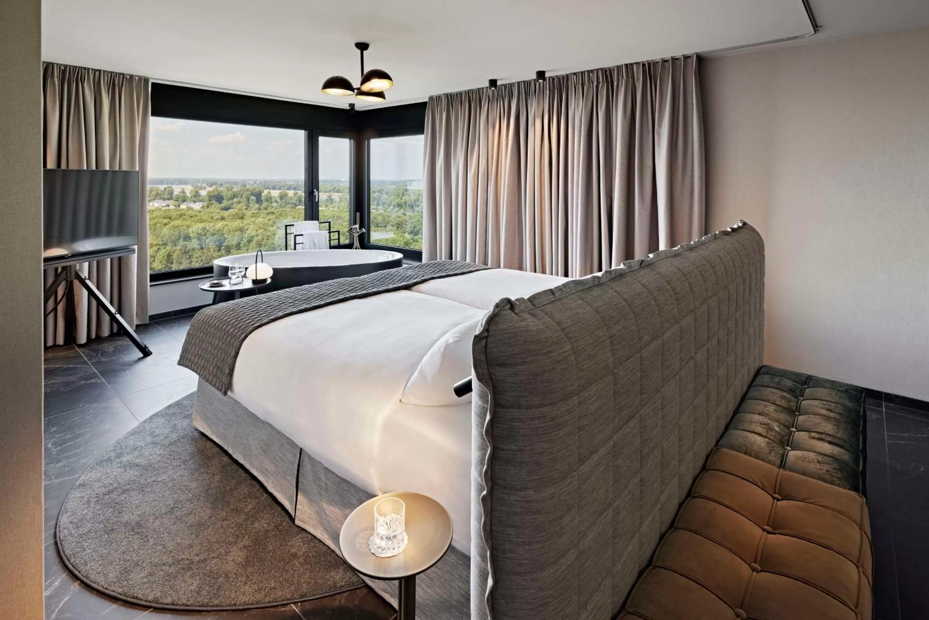 Photo of the whole room, Bed in Lindner Hotel Dusseldorf Seestern, part of JdV by Hyatt