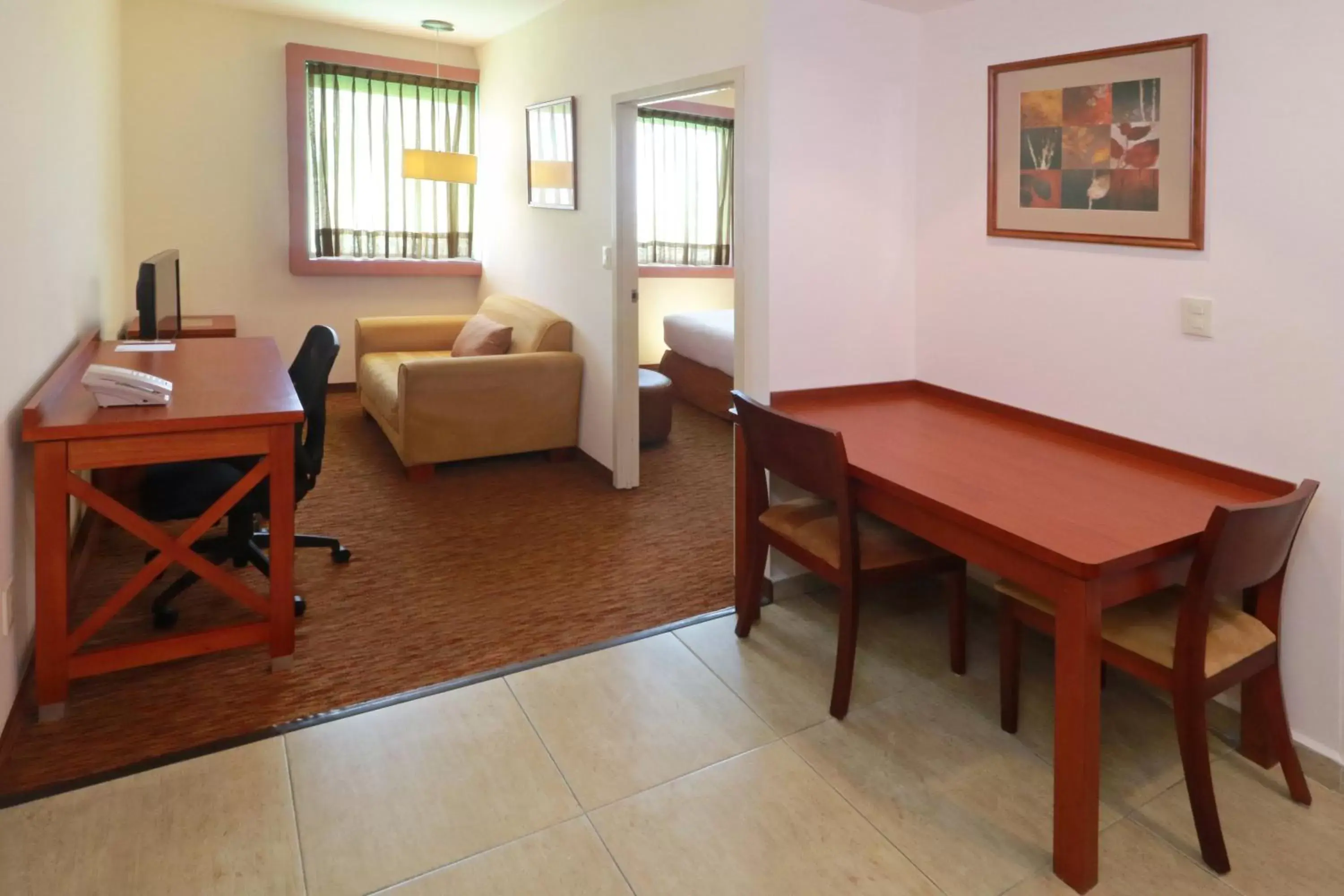 Photo of the whole room, Seating Area in Staybridge Suites Queretaro, an IHG Hotel