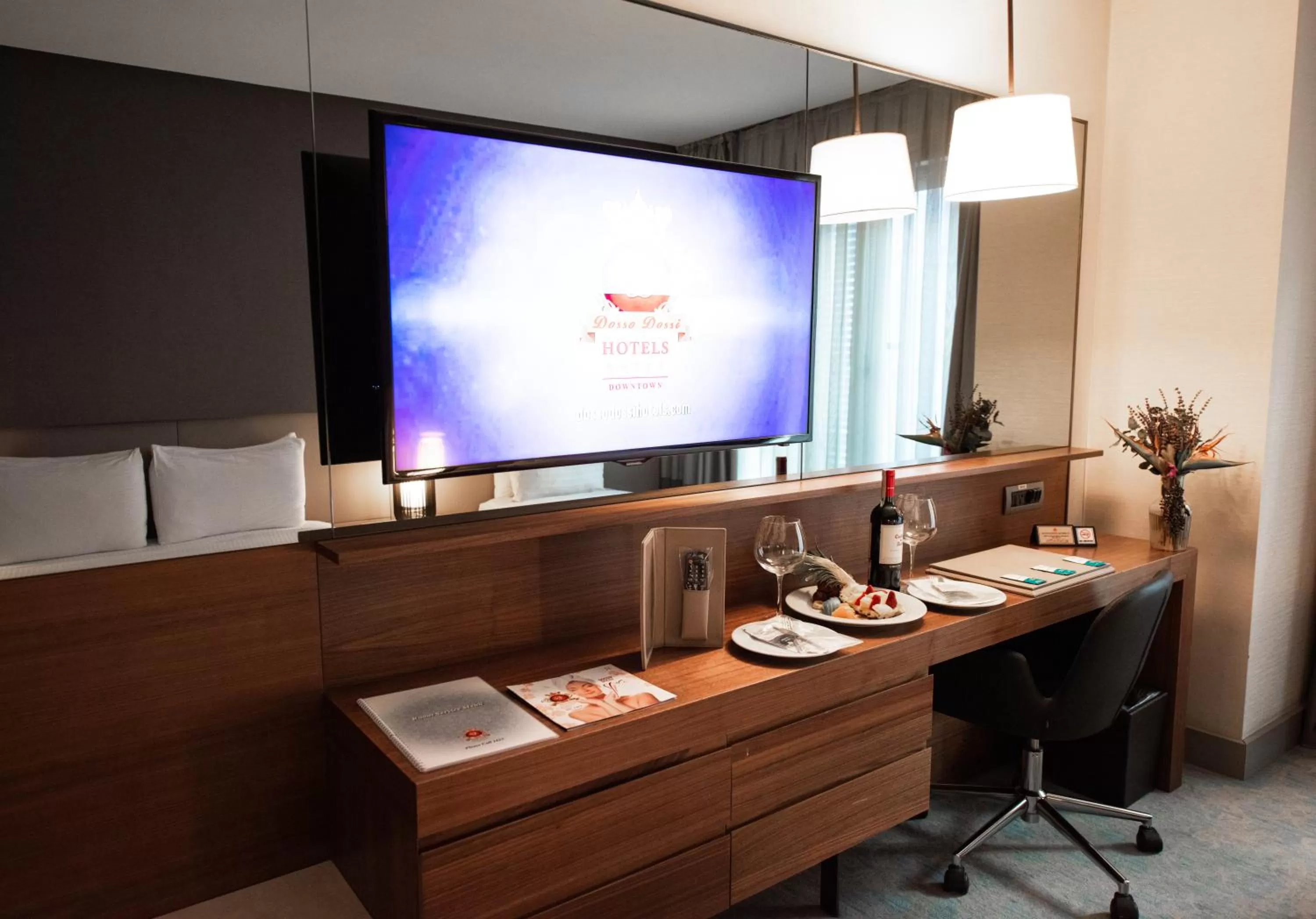 TV and multimedia in Dosso Dossi Hotels & SPA Downtown