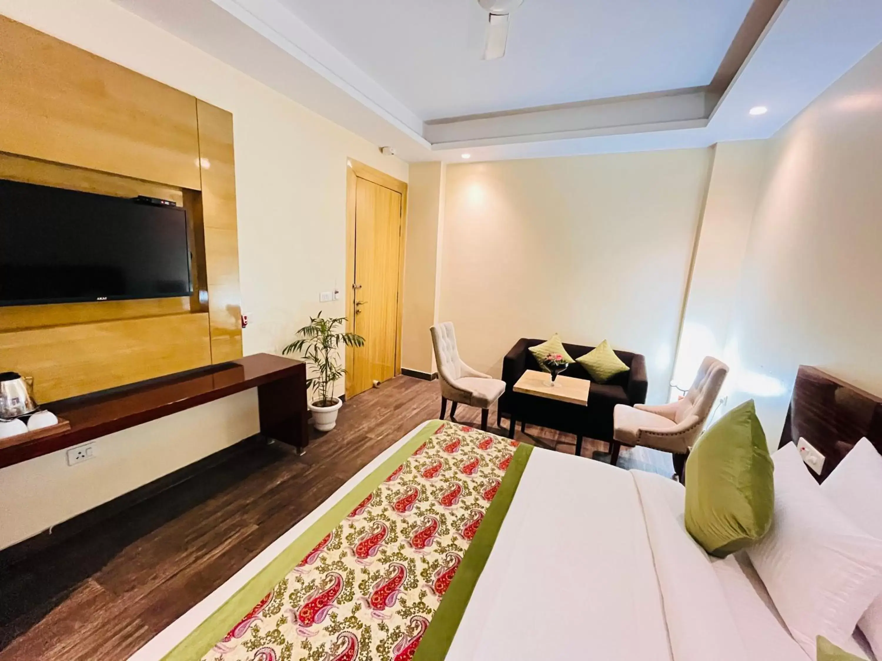 Bed, Seating Area in Hotel Banz - Near Delhi International Airport