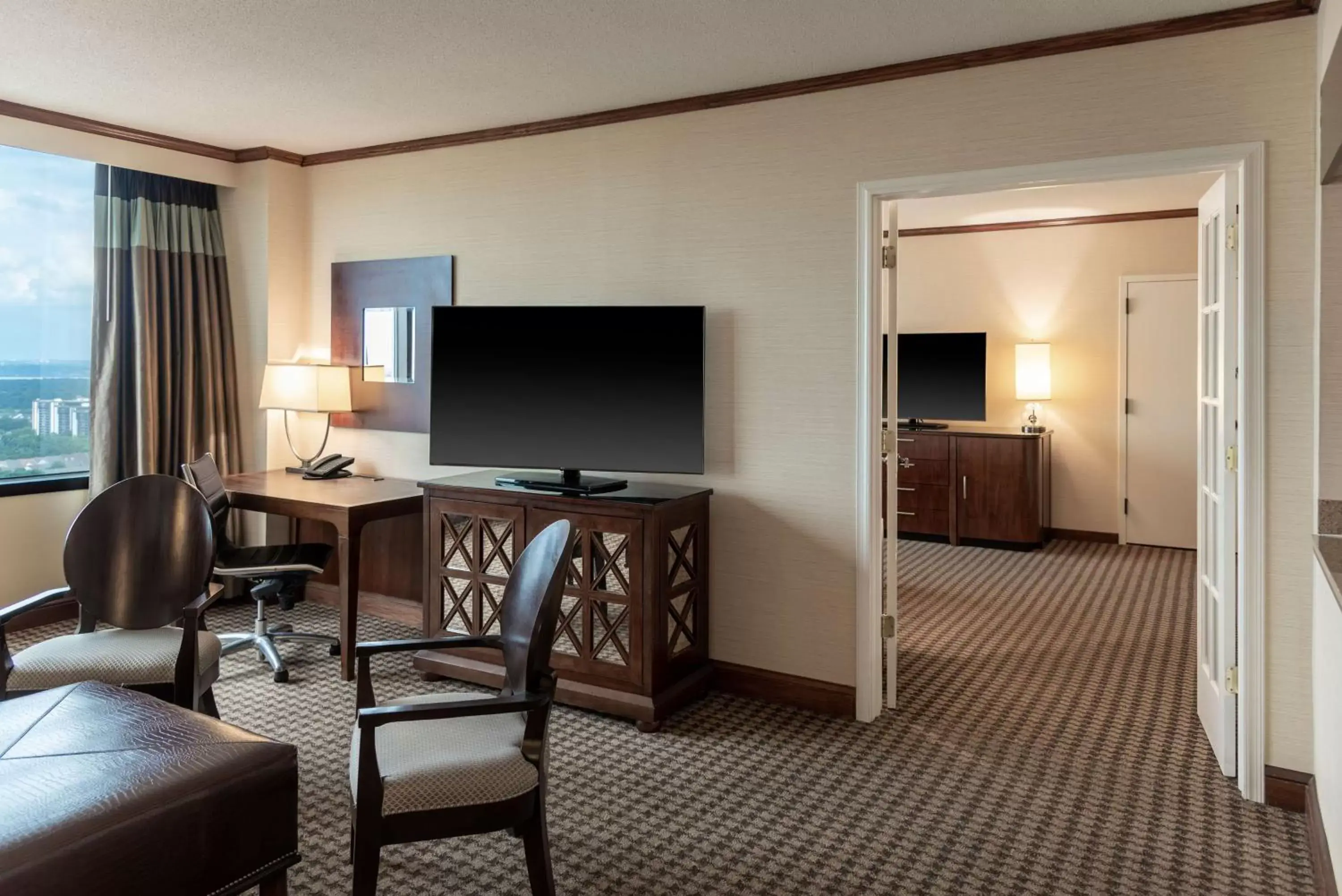 Bedroom, TV/Entertainment Center in Hilton Alexandria Mark Center