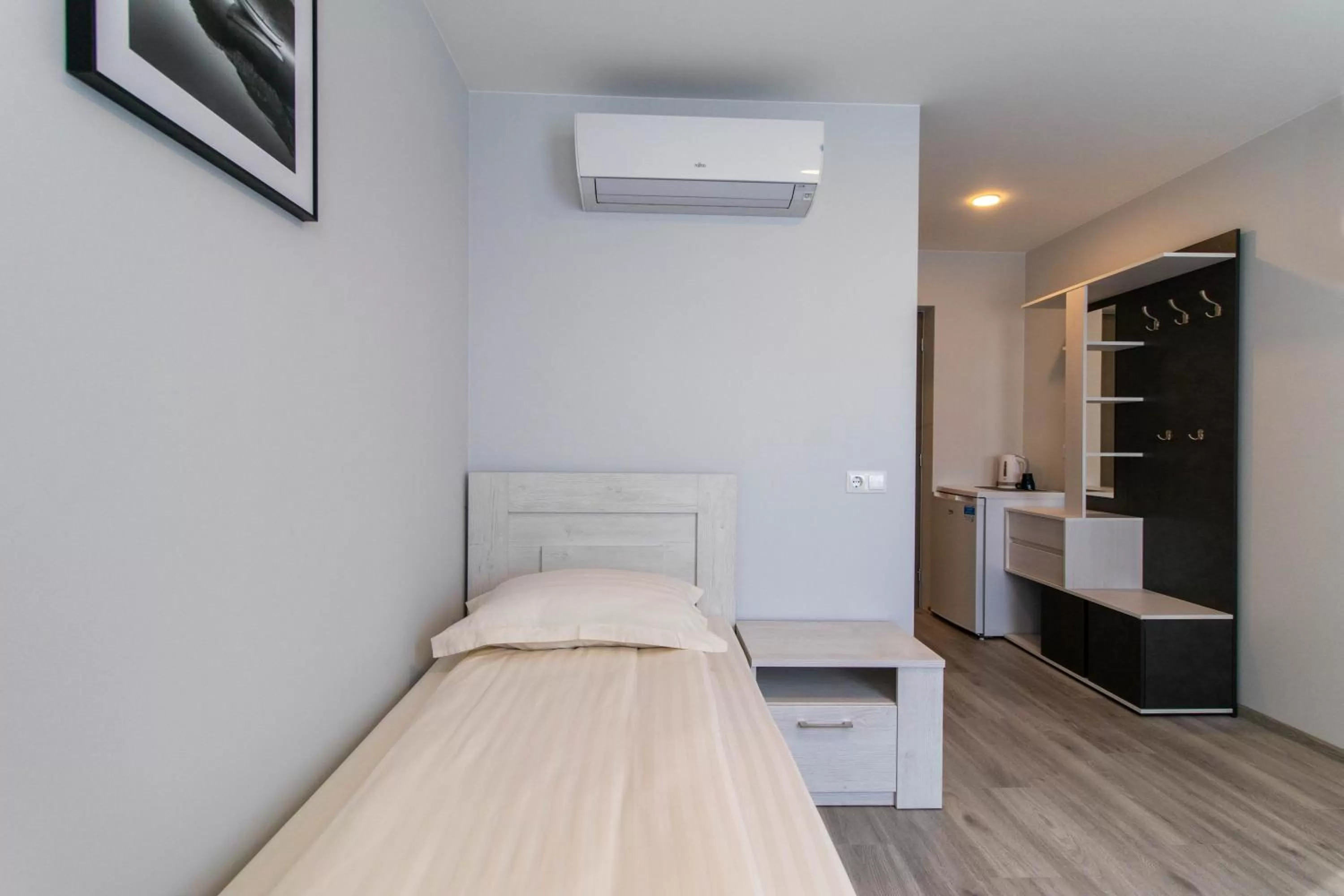 Bed in Dzukija Hotel