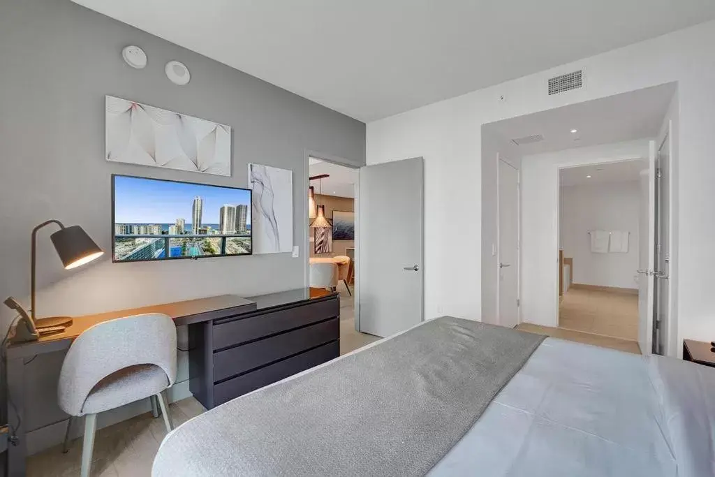 Bed in Amazing Apartments at H Beach House