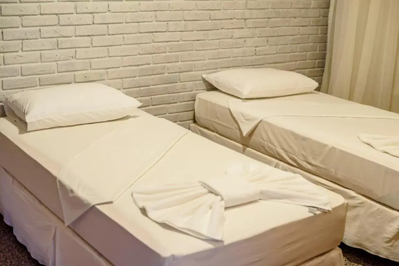 Bed in Hotel Vento Brasil