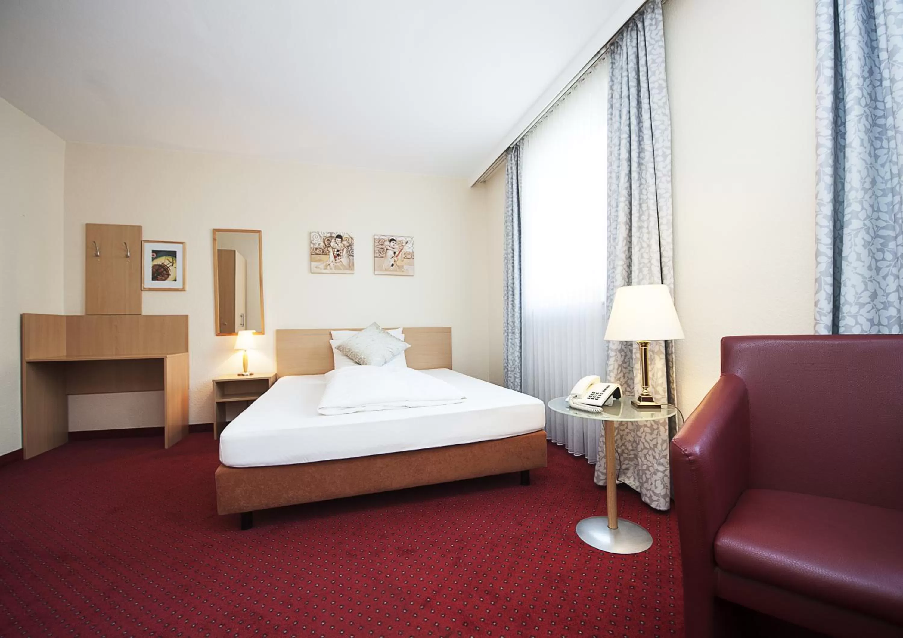 Photo of the whole room, Bed in Comfort Garni Stadtzentrum Hotel