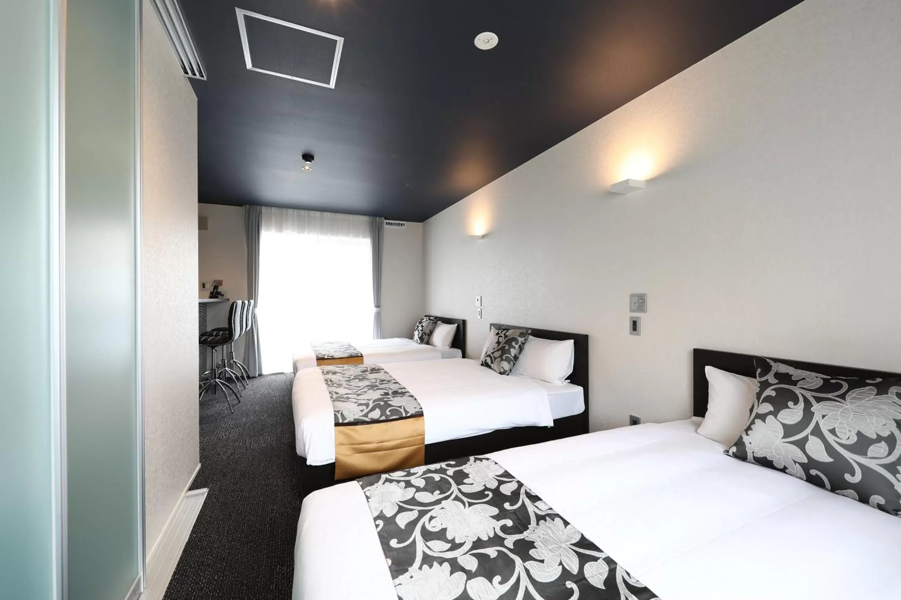 Photo of the whole room, Bed in GRAND BASE Hakata City