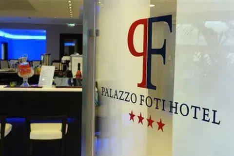 Property logo or sign in Palazzo Foti Hotel