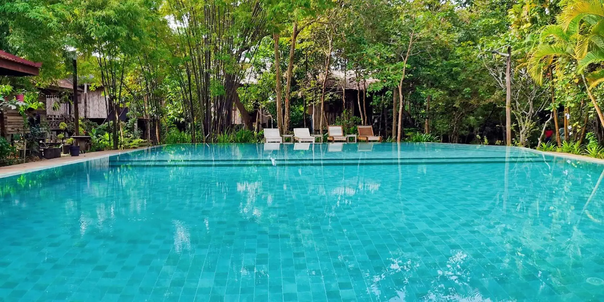 Swimming Pool in Palm Village Resort & Spa