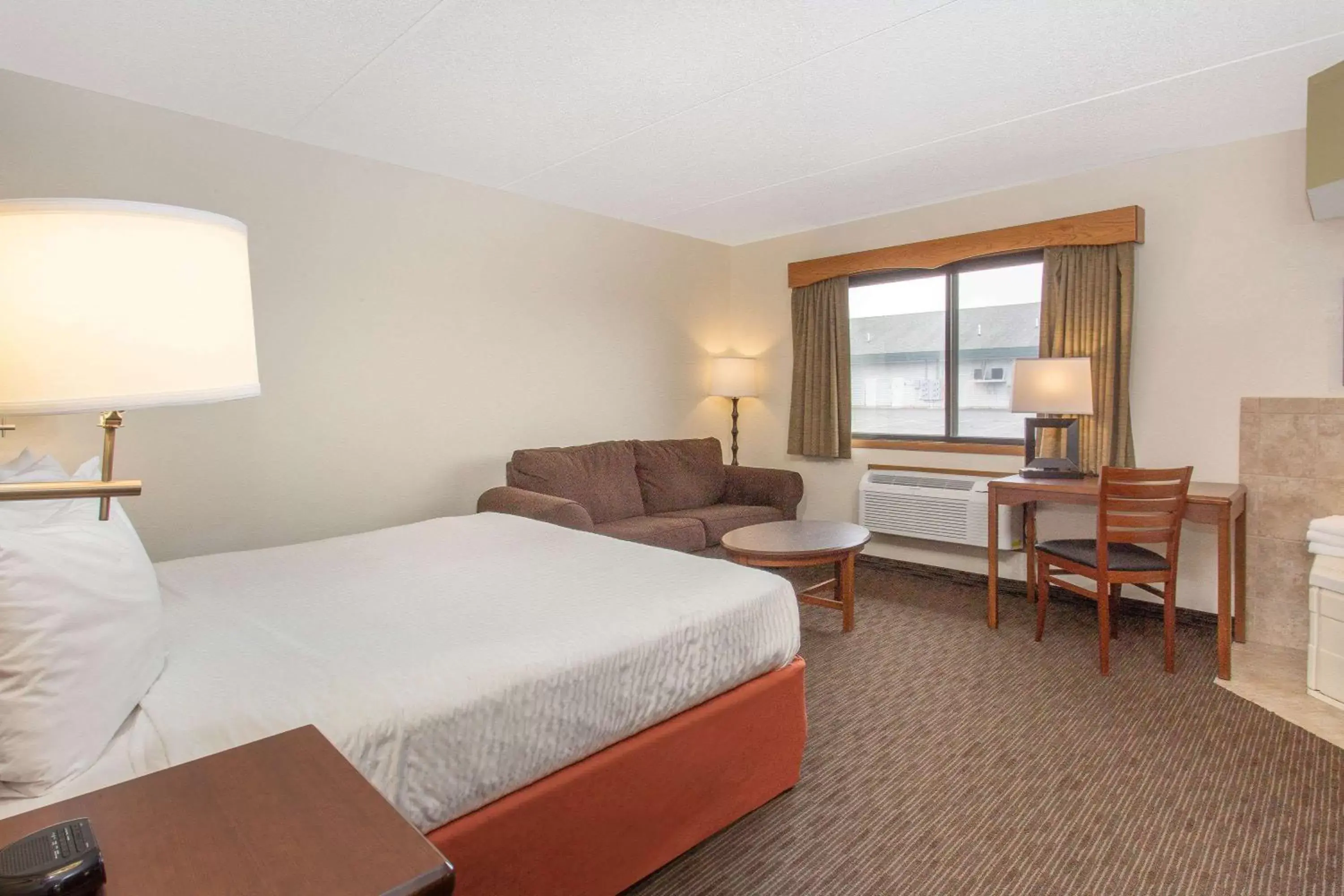 Photo of the whole room, Bed in AmericInn by Wyndham Calumet