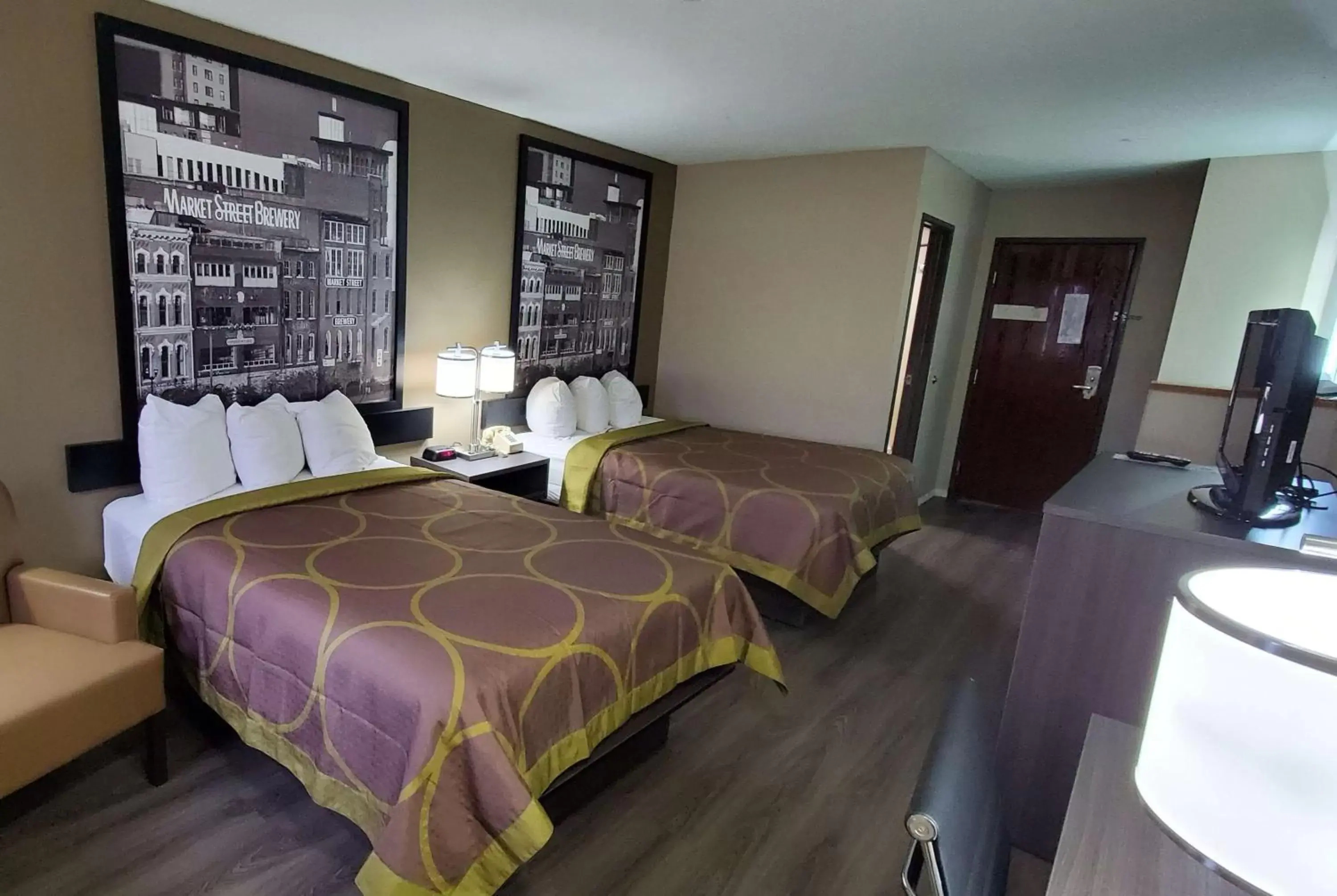 Photo of the whole room, Bed in Super 8 by Wyndham Paris