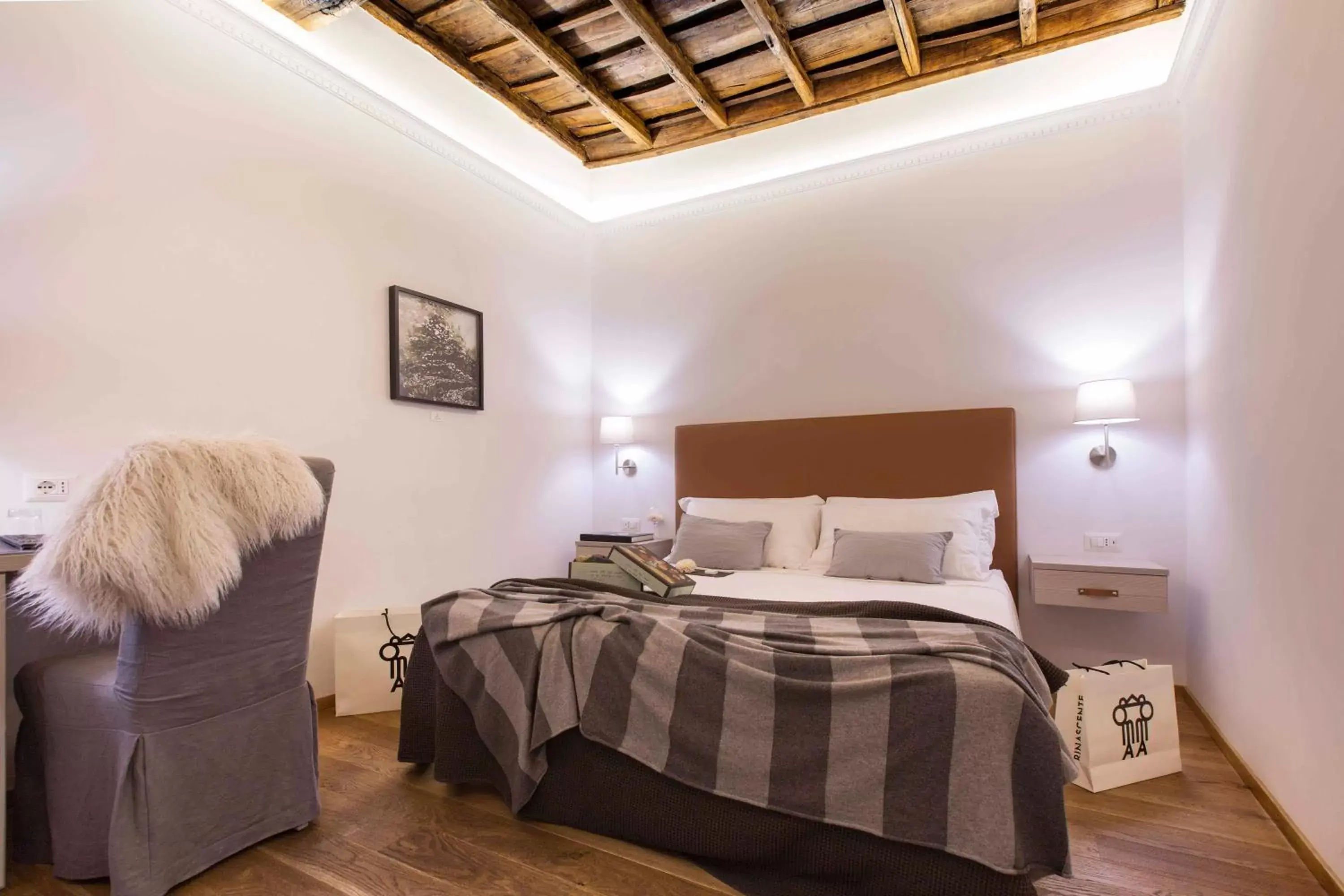 Bed in Giuturna Boutique Hotel