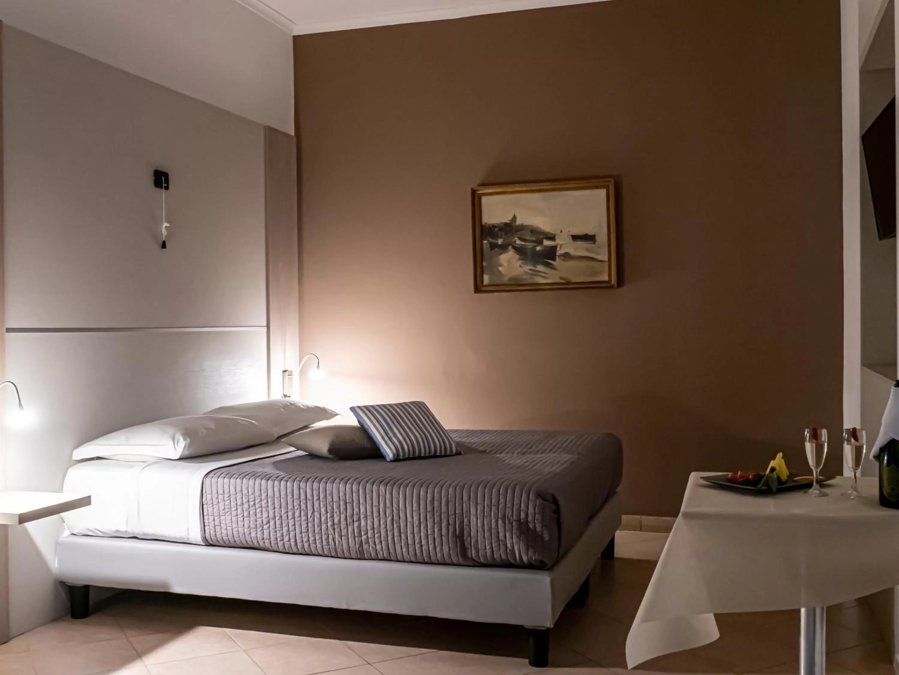 Bed in San Marco Hotel