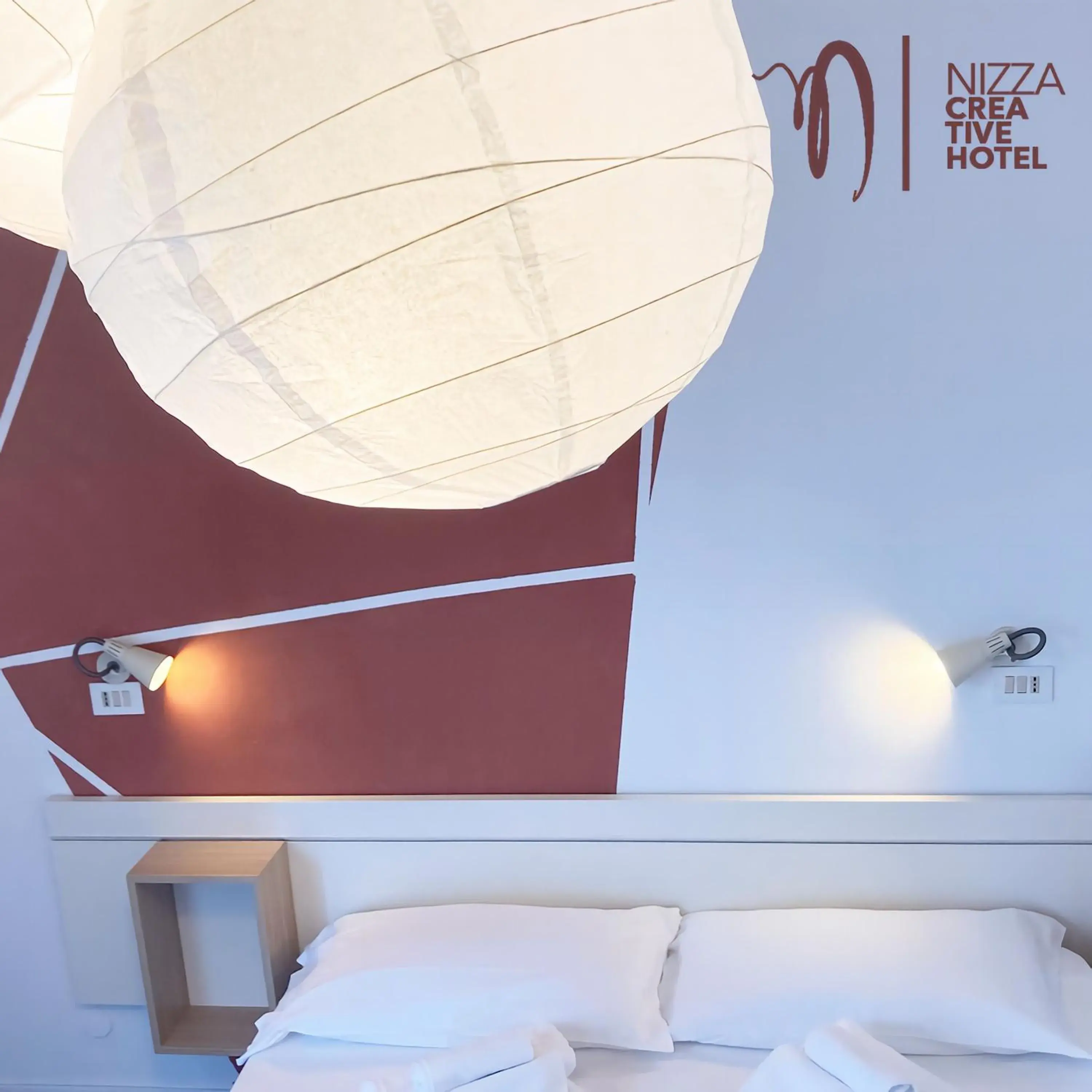 Bed in Hotel Nizza Creative Hotel