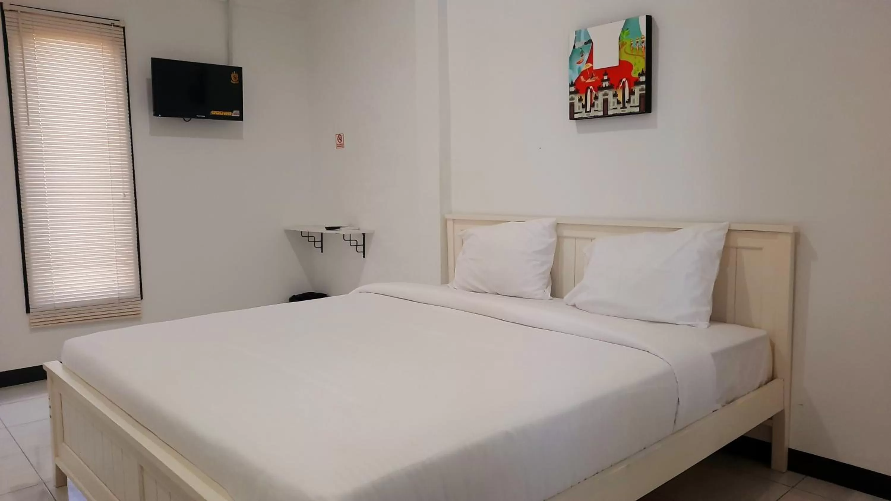 Bed in COZY STAY KUPANG