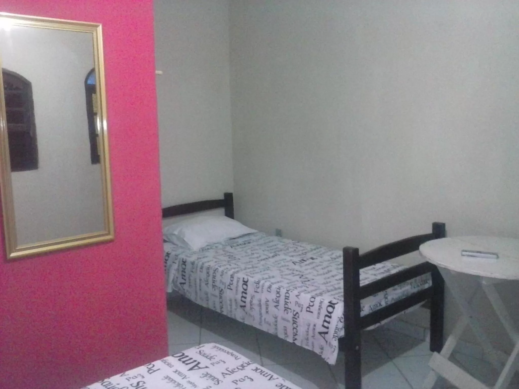 Photo of the whole room, Bed in Pousada da Rose Paraty