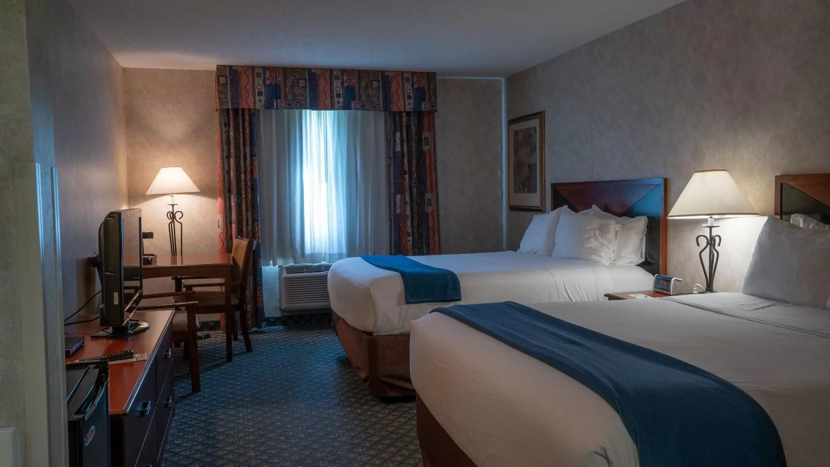 Bed in Miles City Hotel & Suites