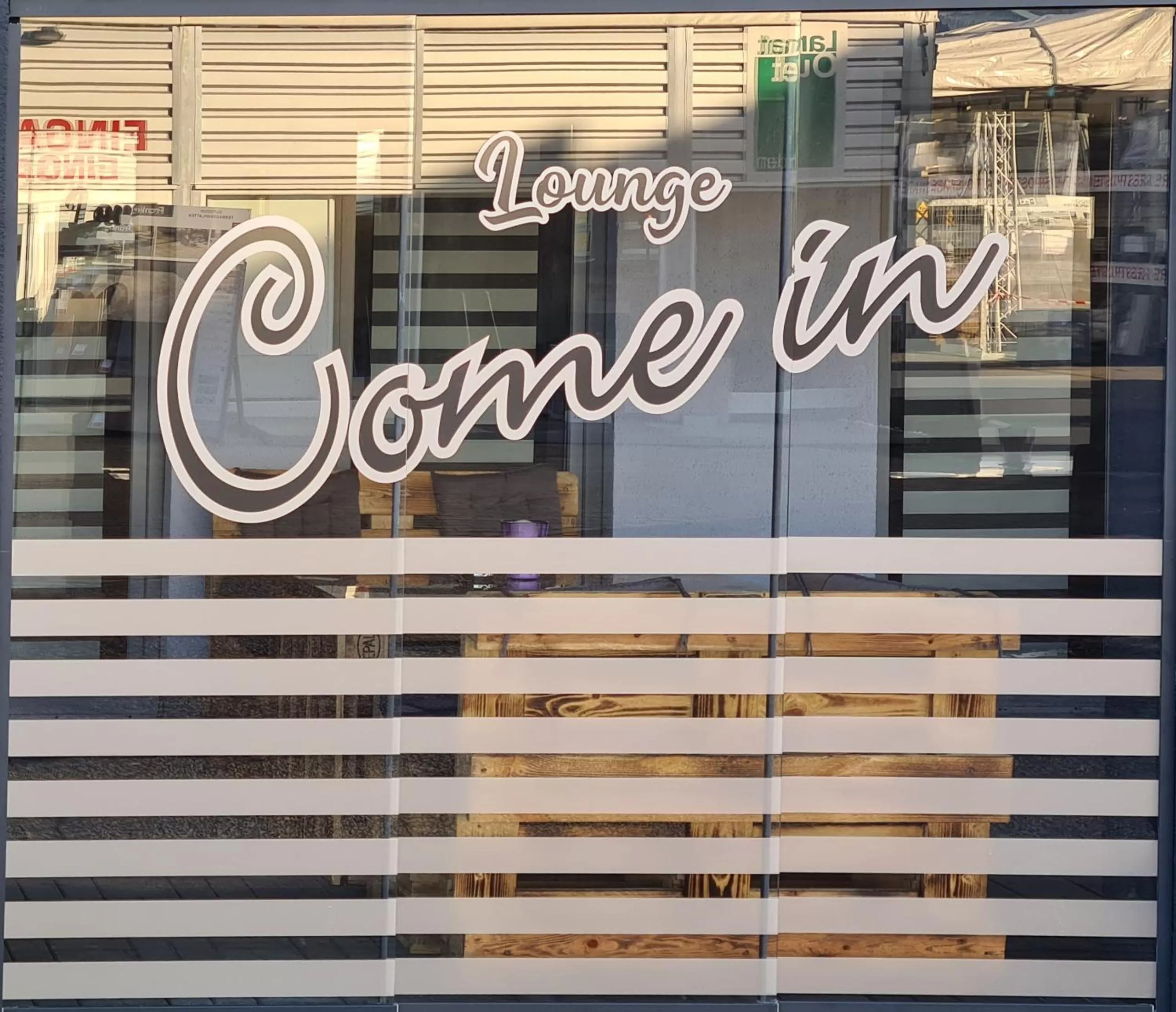 Communal lounge/ TV room in Hotel Come In