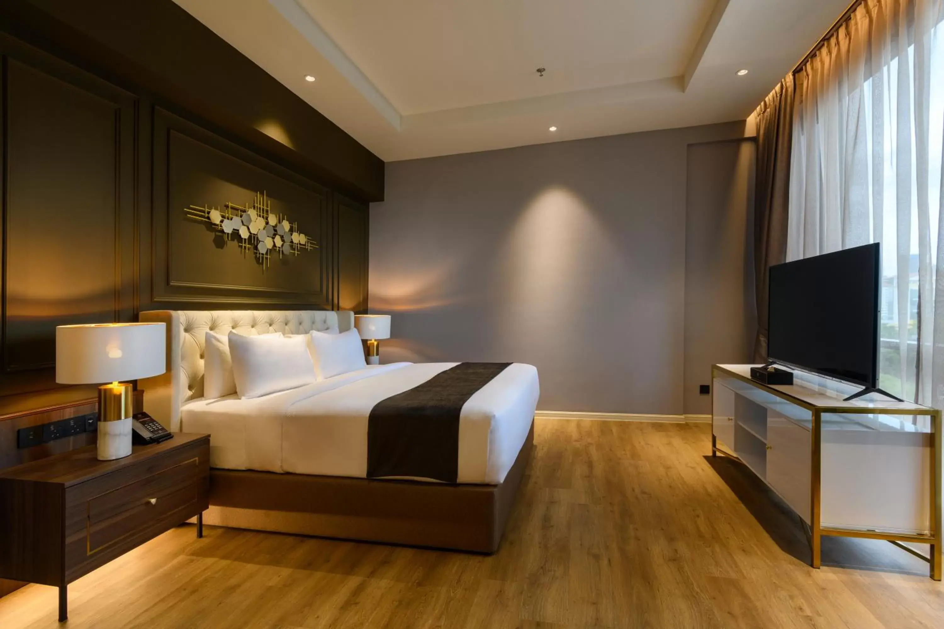 Bed in The Granite Luxury Hotel Penang