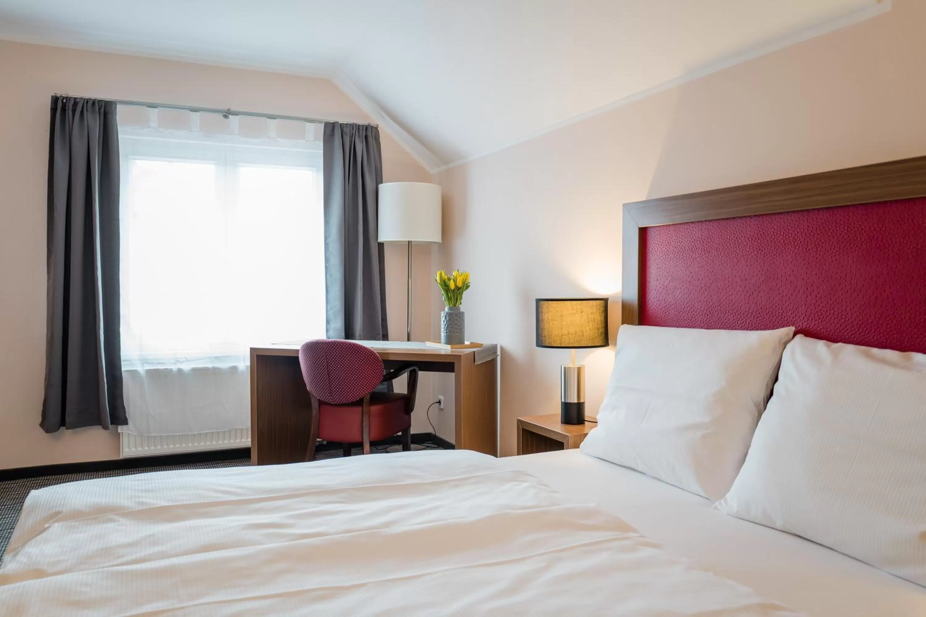 Bed in Point Hotel Apartments and Rooms