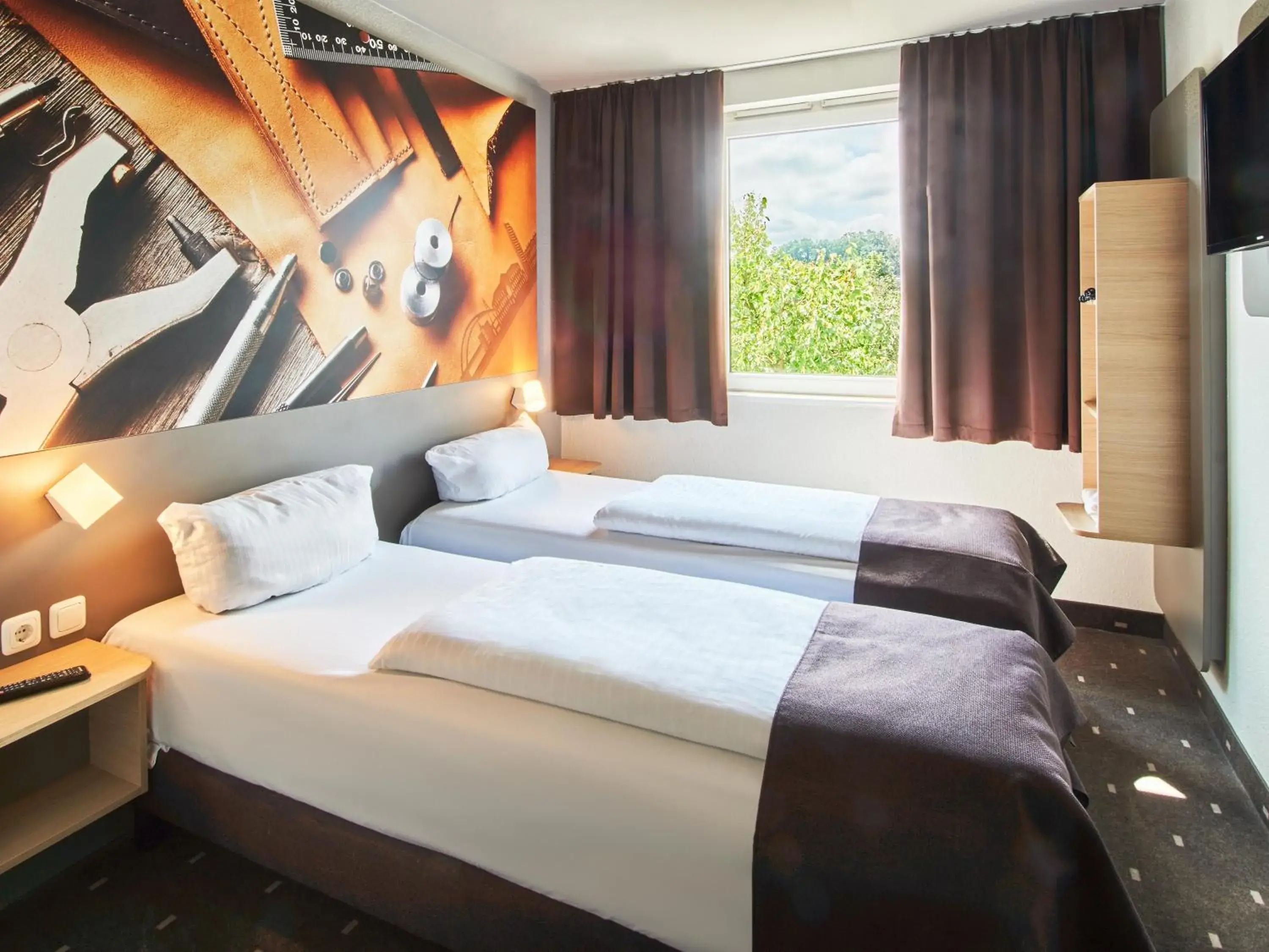 Bed in B&B Hotel Offenbach-Süd Bed in B&B Hotel Offenbach-Süd