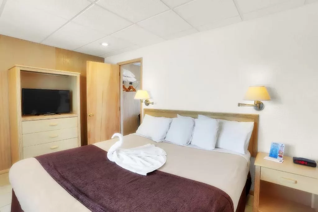 Bed in Heart of Wildwood Boardwalk Motel