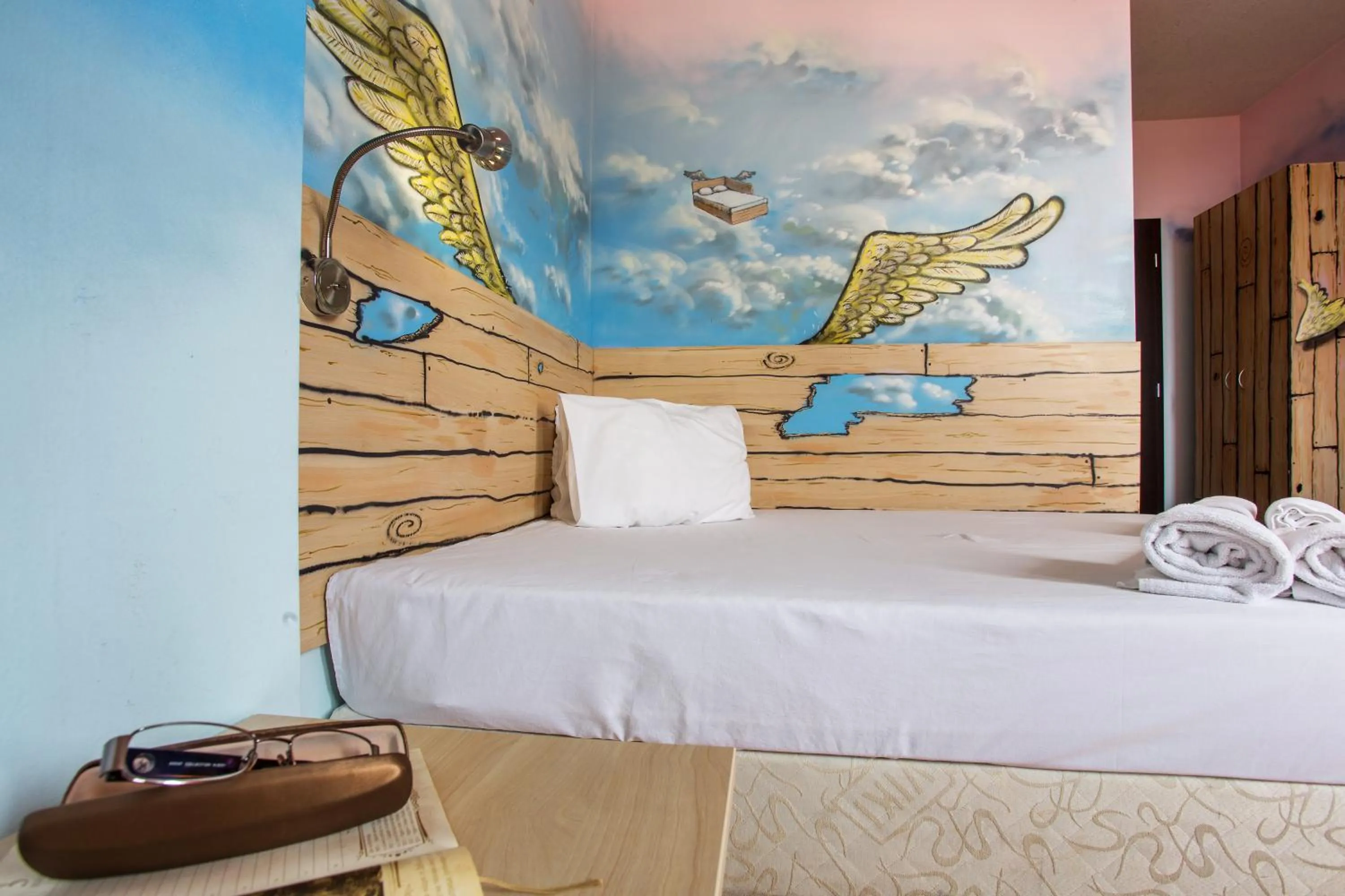 Bed in Art Hotel Simona