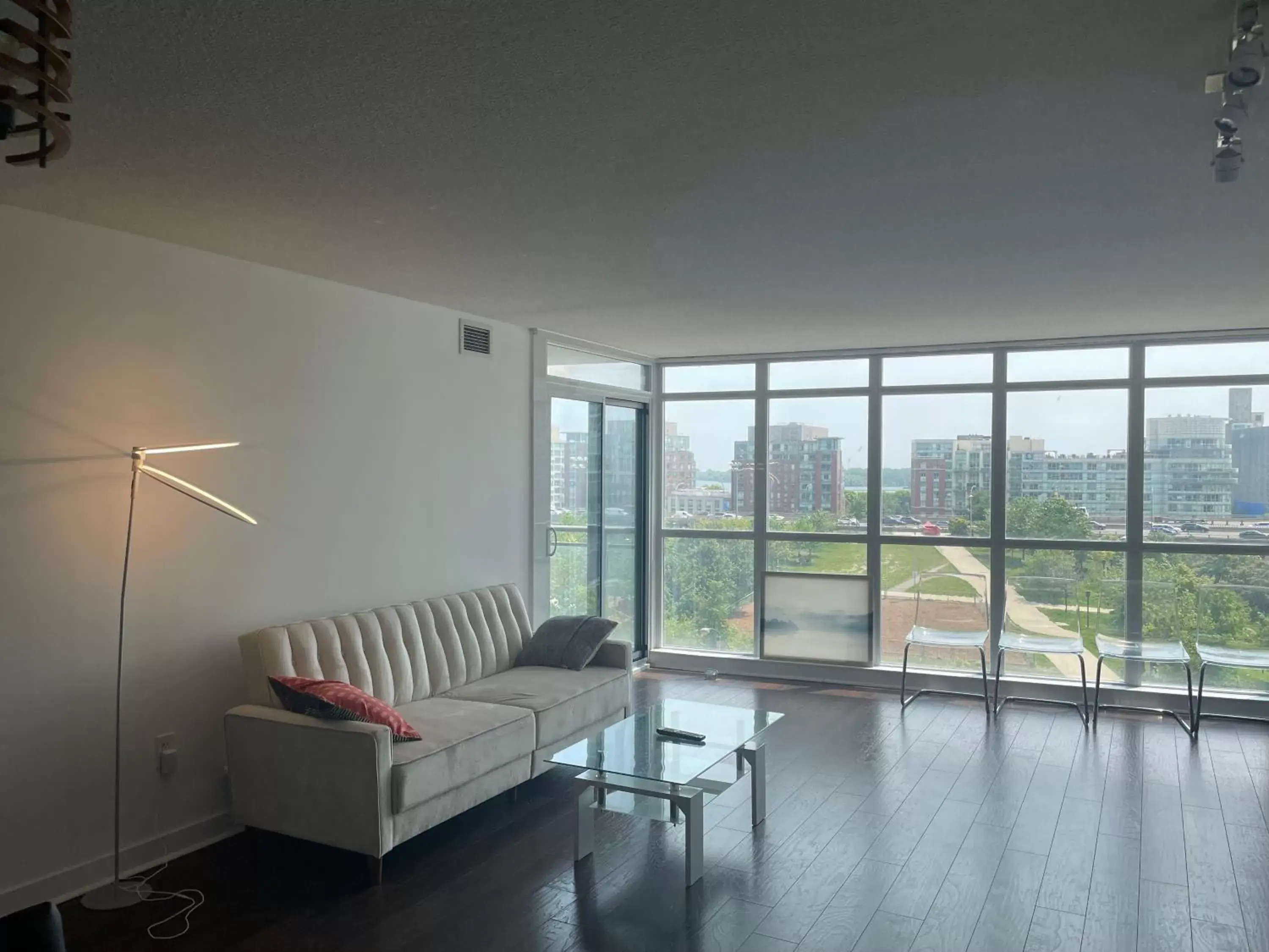 Seating Area in Three BR Condo step to CN tower Rogers Center with Free parking