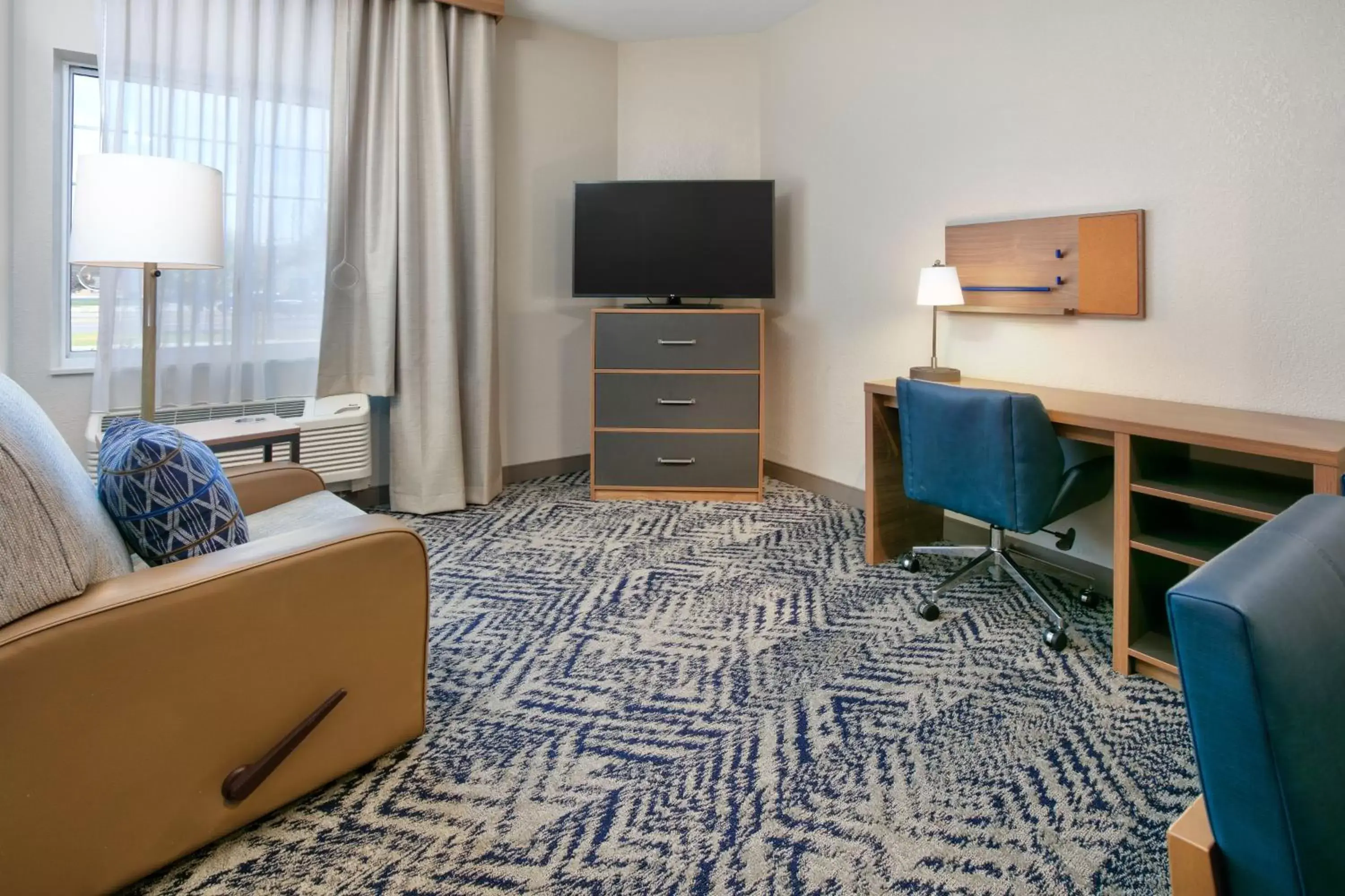 Photo of the whole room, TV/Entertainment Center in Candlewood Suites Idaho Falls, an IHG Hotel