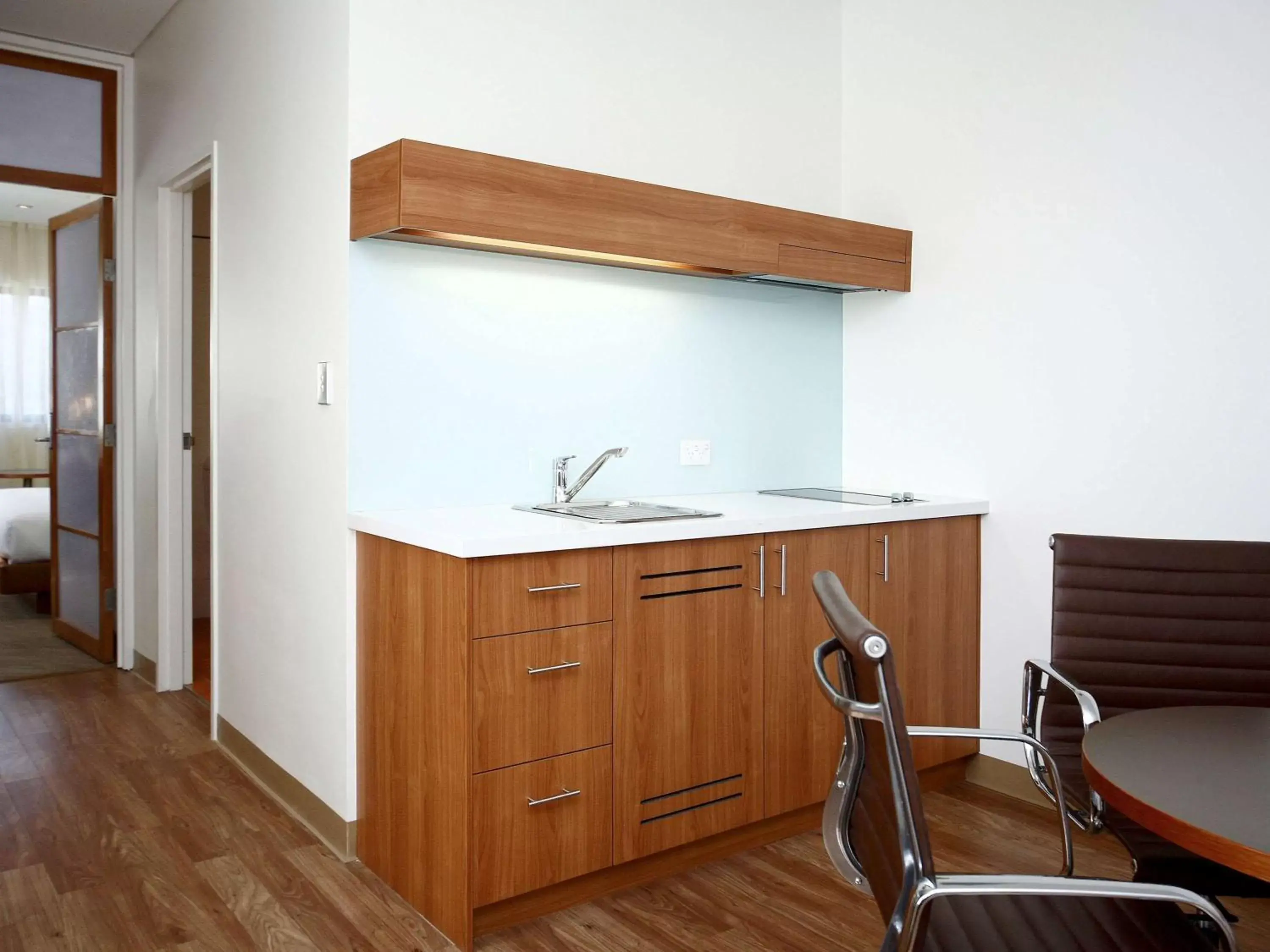 Bedroom, Kitchen/Kitchenette in Novotel Canberra